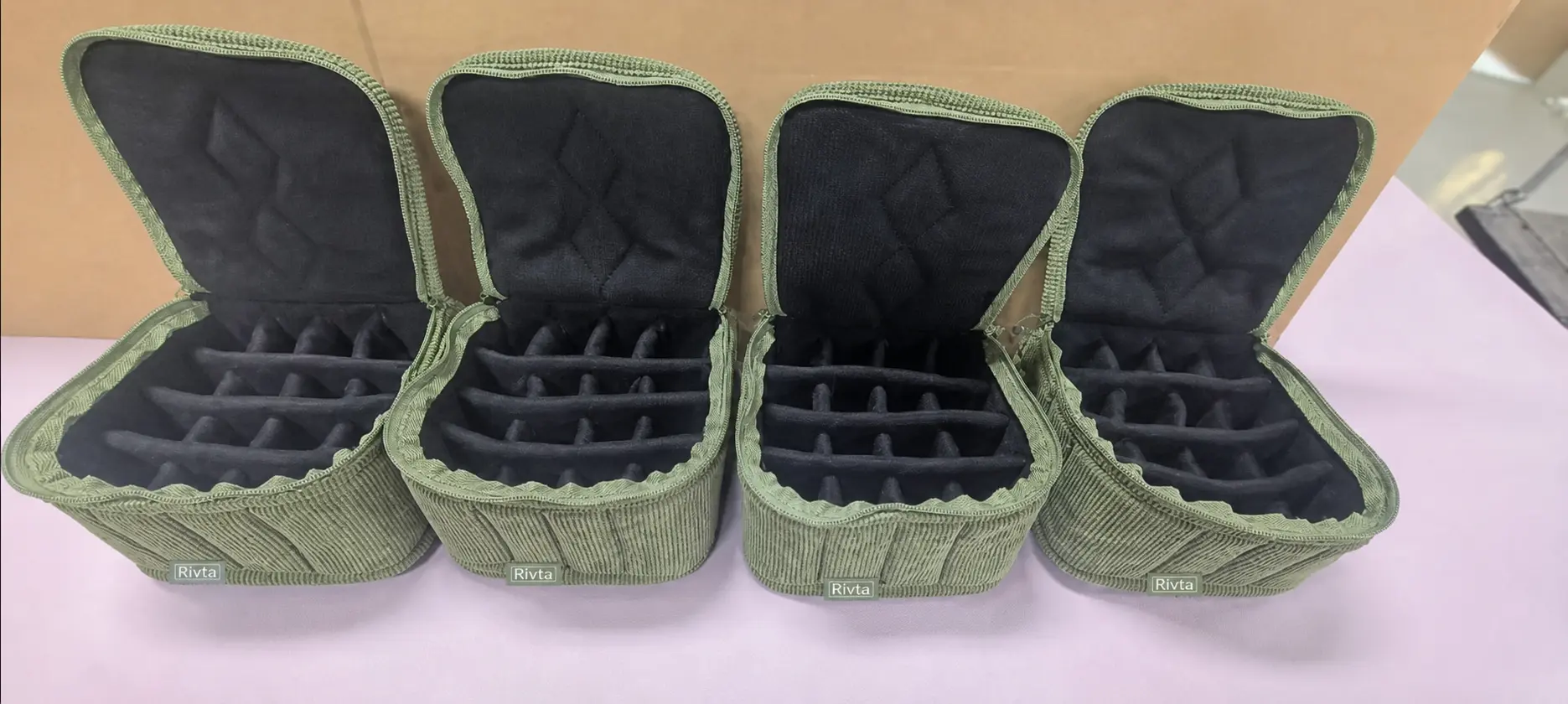 16-slot custom essential oil travel case with sewn dividers and padding.