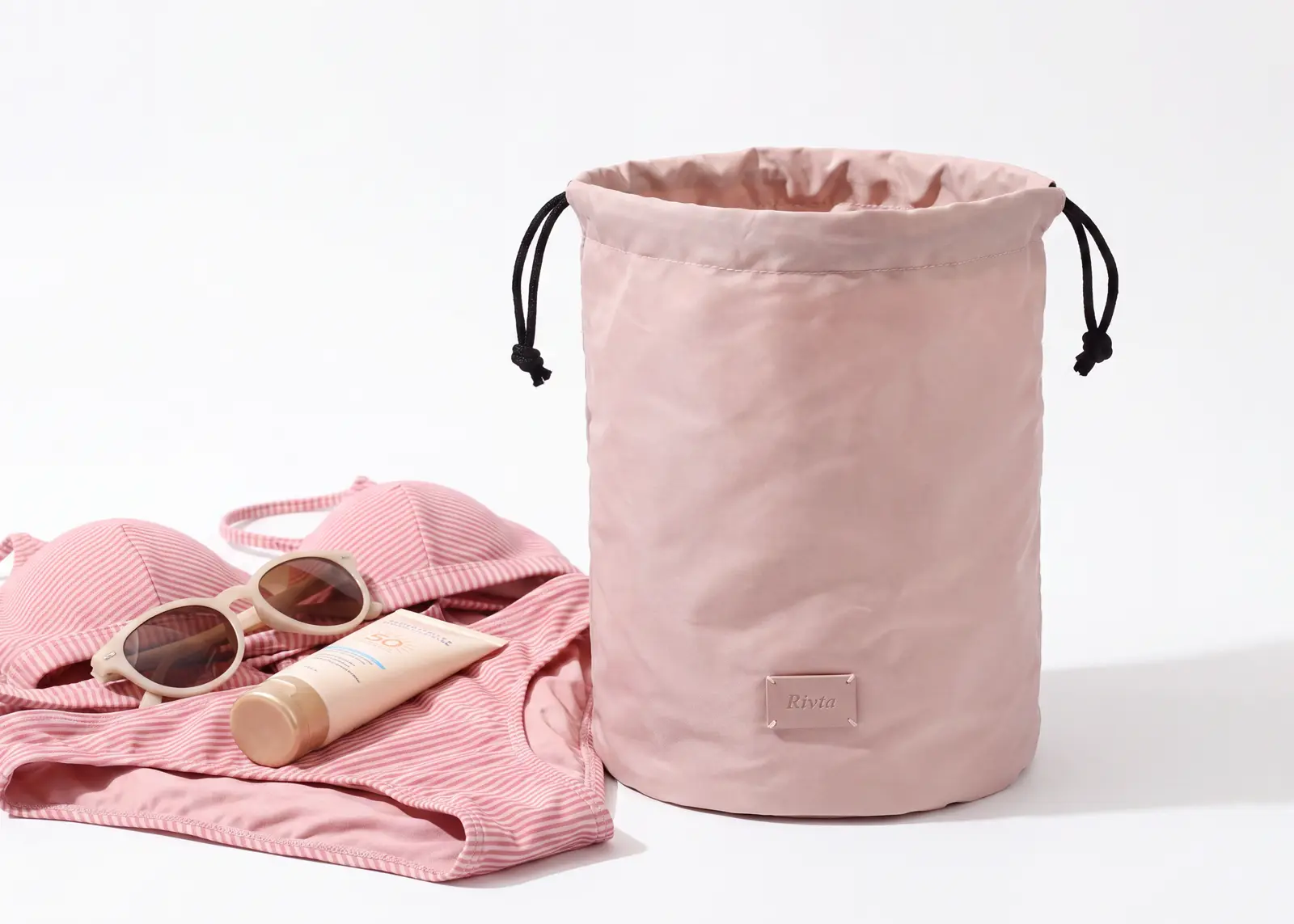 Drawstring damp swimwear bag construction reference from Rivta