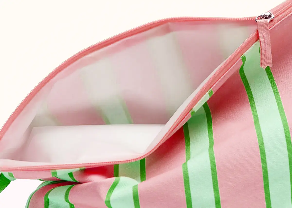 Fabric zipper pouch with wipe-clean lining construction reference from Rivta