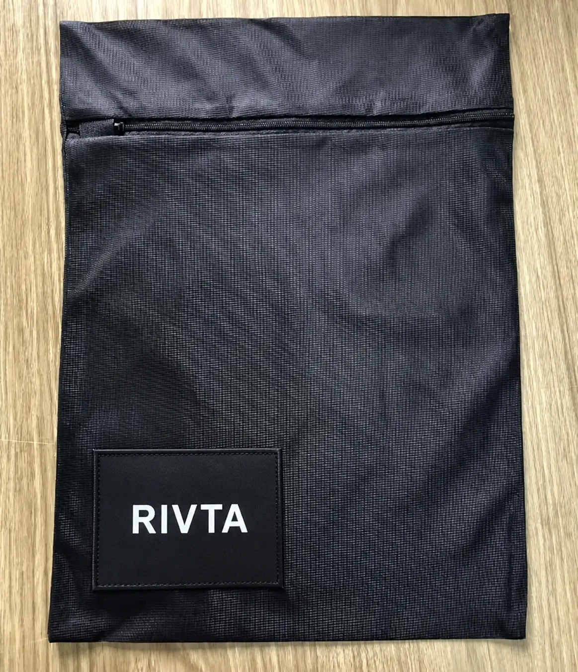 Anonymized 30 by 39 centimeter polyester mesh laundry wash bag from a completed Rivta order