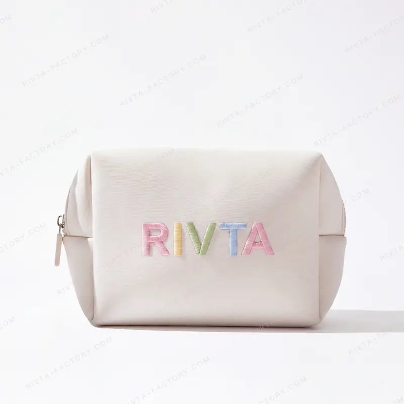 Custom ivory neoprene cosmetic bag with colourful embroidered logo for beauty brand OEM project - CBO129