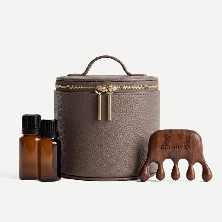 Round textured cosmetic case with a top handle and zip-around lid