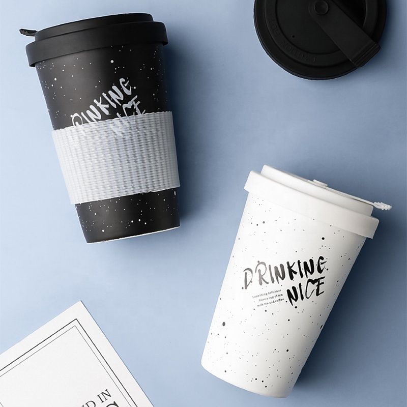 New Arrivals of Popular Ceramic Travel Mug with Silicone Cover Black and White Ceramic Mug with Lid