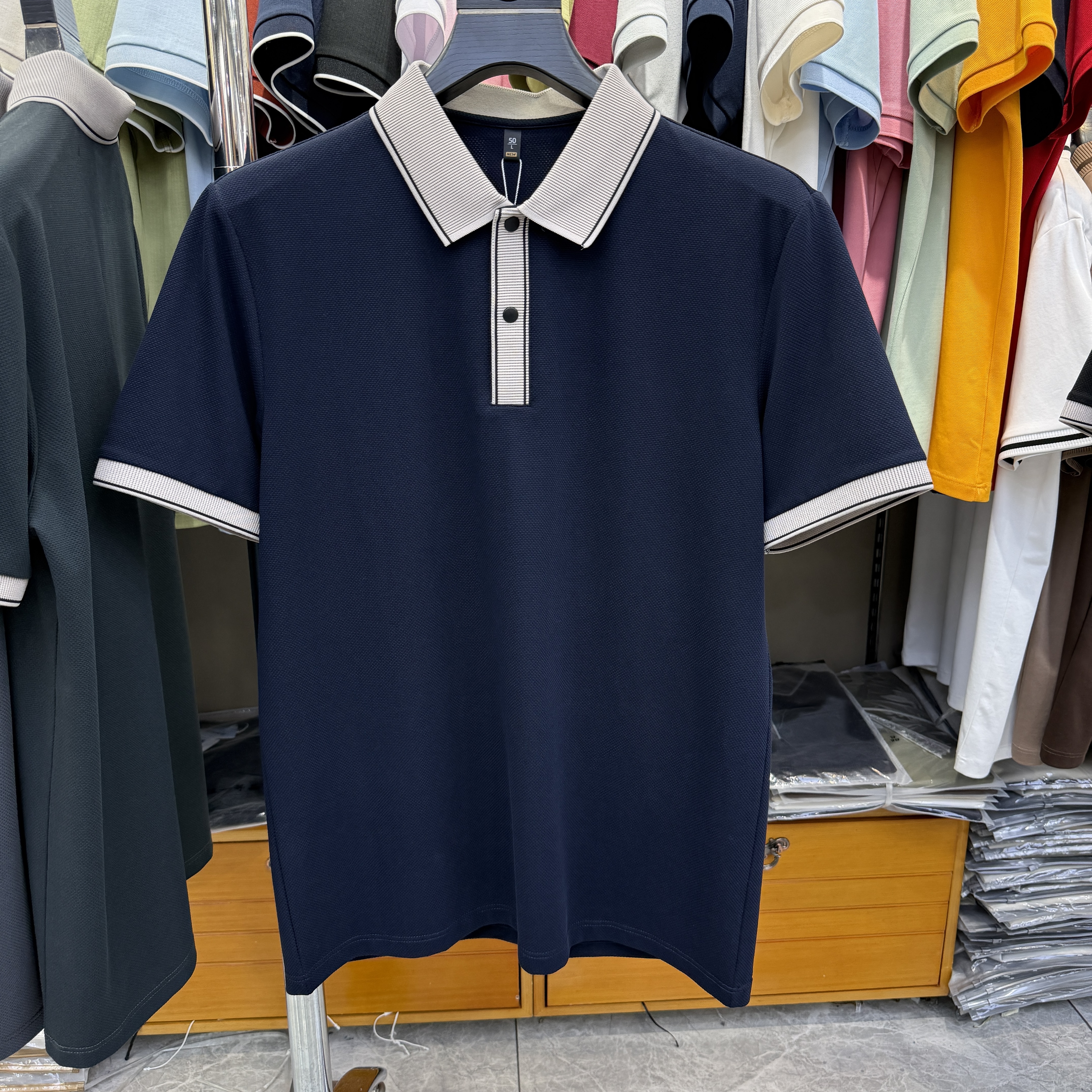 JM6902 54.4% Polyester 39.4% Cotton 6.2% Spandex Short-sleeve polo shirt