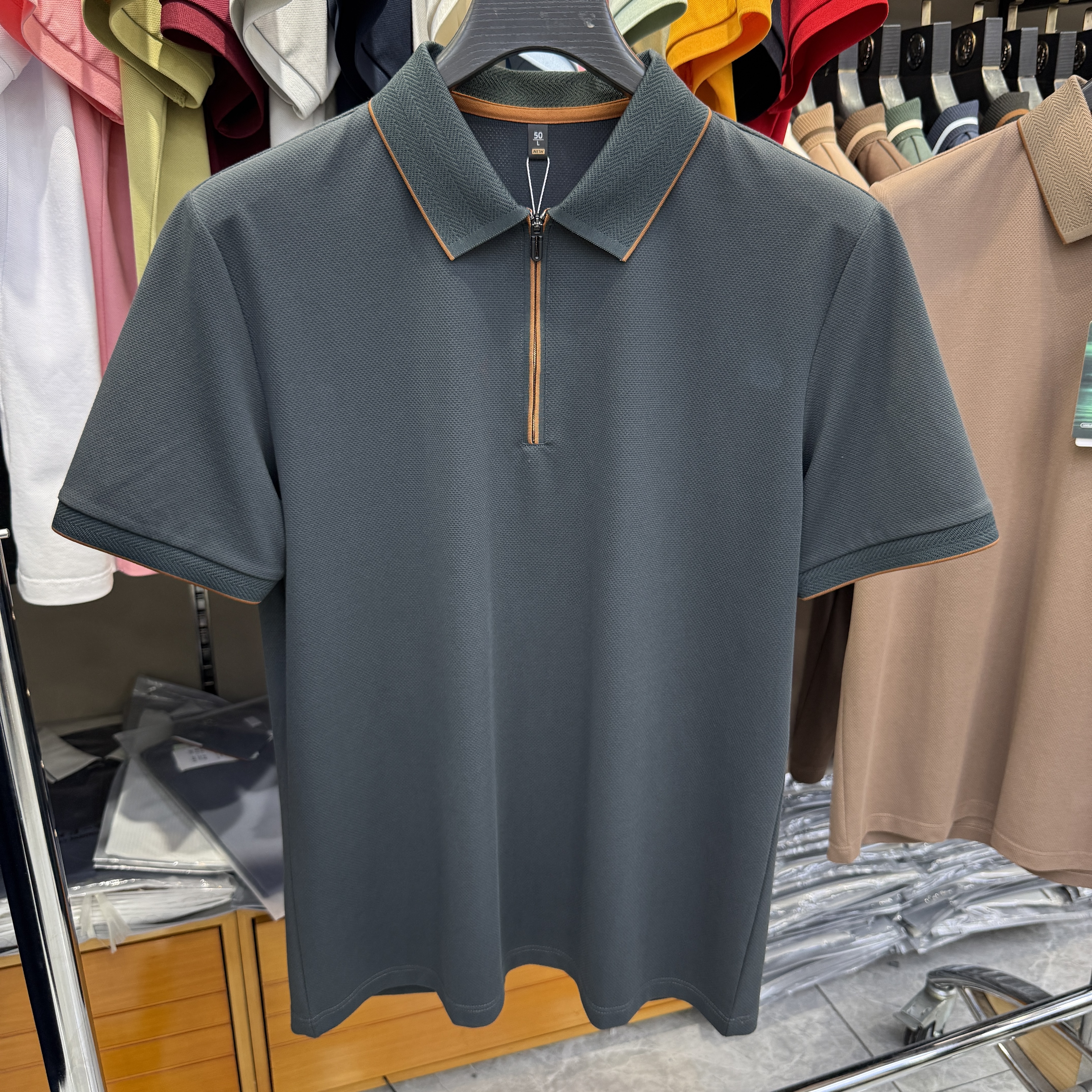 JM6903 54.4% Polyester 39.4% Cotton 6.2% Spandex Short-sleeve polo shirt