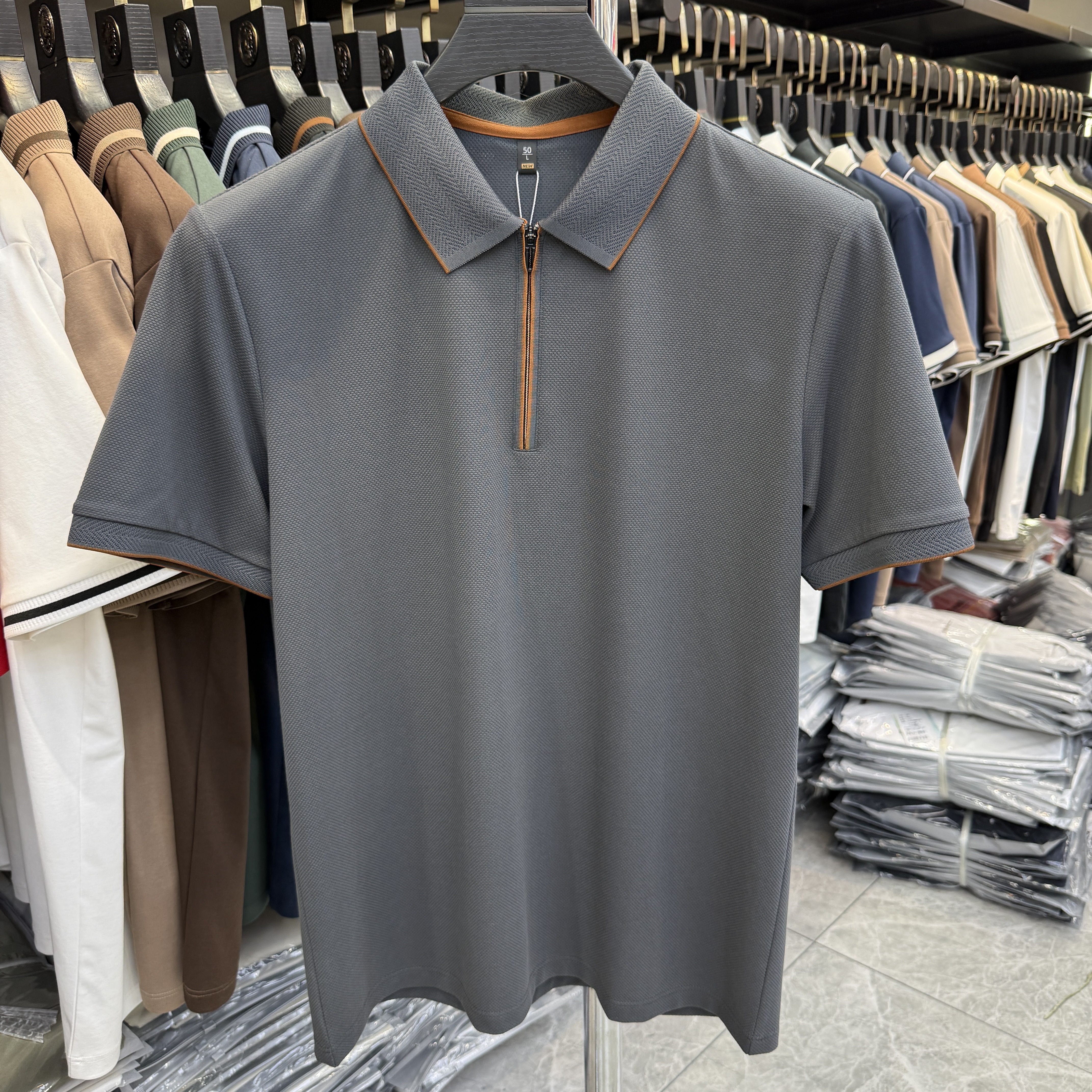 JM6903 54.4% Polyester 39.4% Cotton 6.2% Spandex Short-sleeve polo shirt