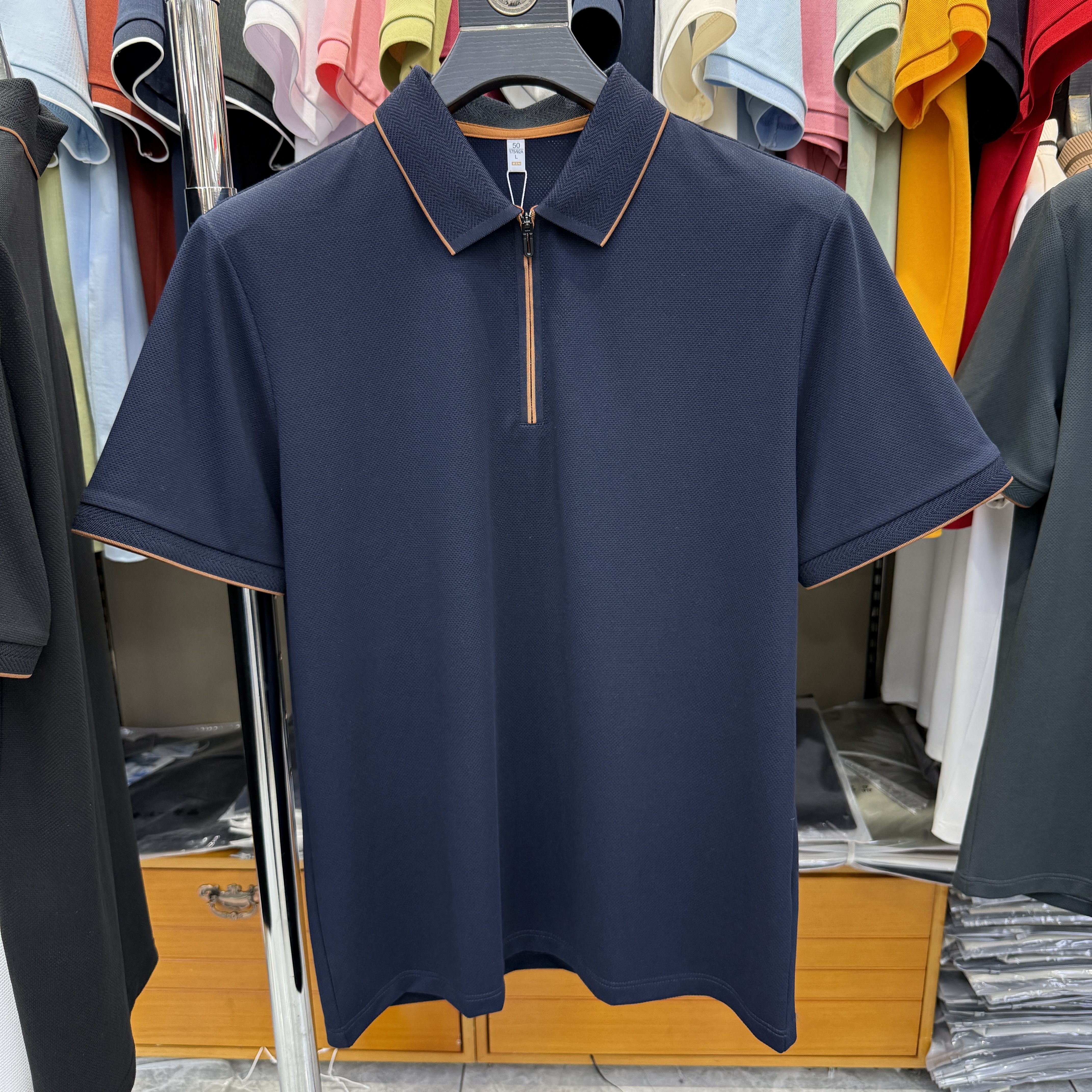 JM6903 54.4% Polyester 39.4% Cotton 6.2% Spandex Short-sleeve polo shirt