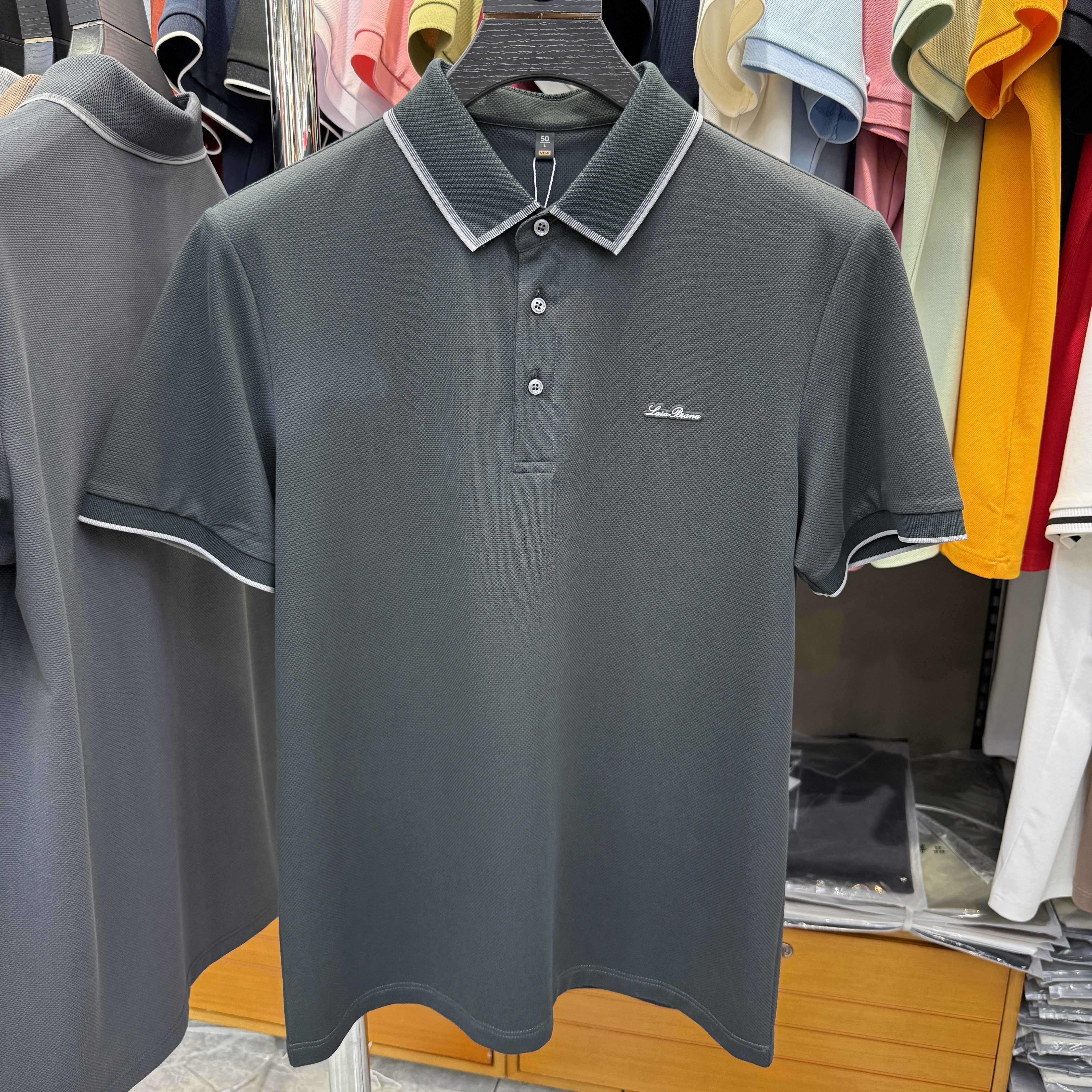 JM6906 54.4% Polyester 39.4% Cotton 6.2% Spandex Short-sleeve polo shirt