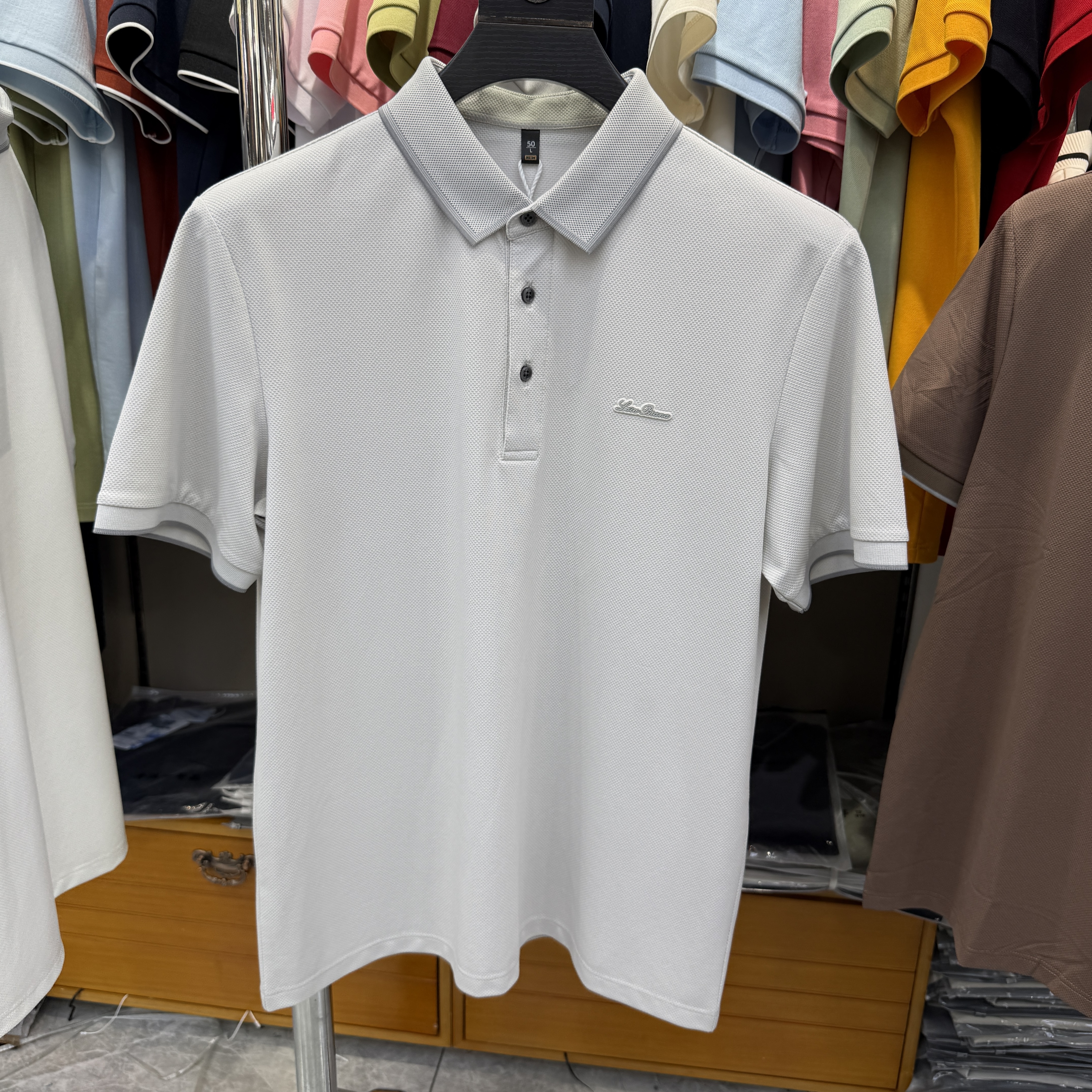 JM6906 54.4% Polyester 39.4% Cotton 6.2% Spandex Short-sleeve polo shirt