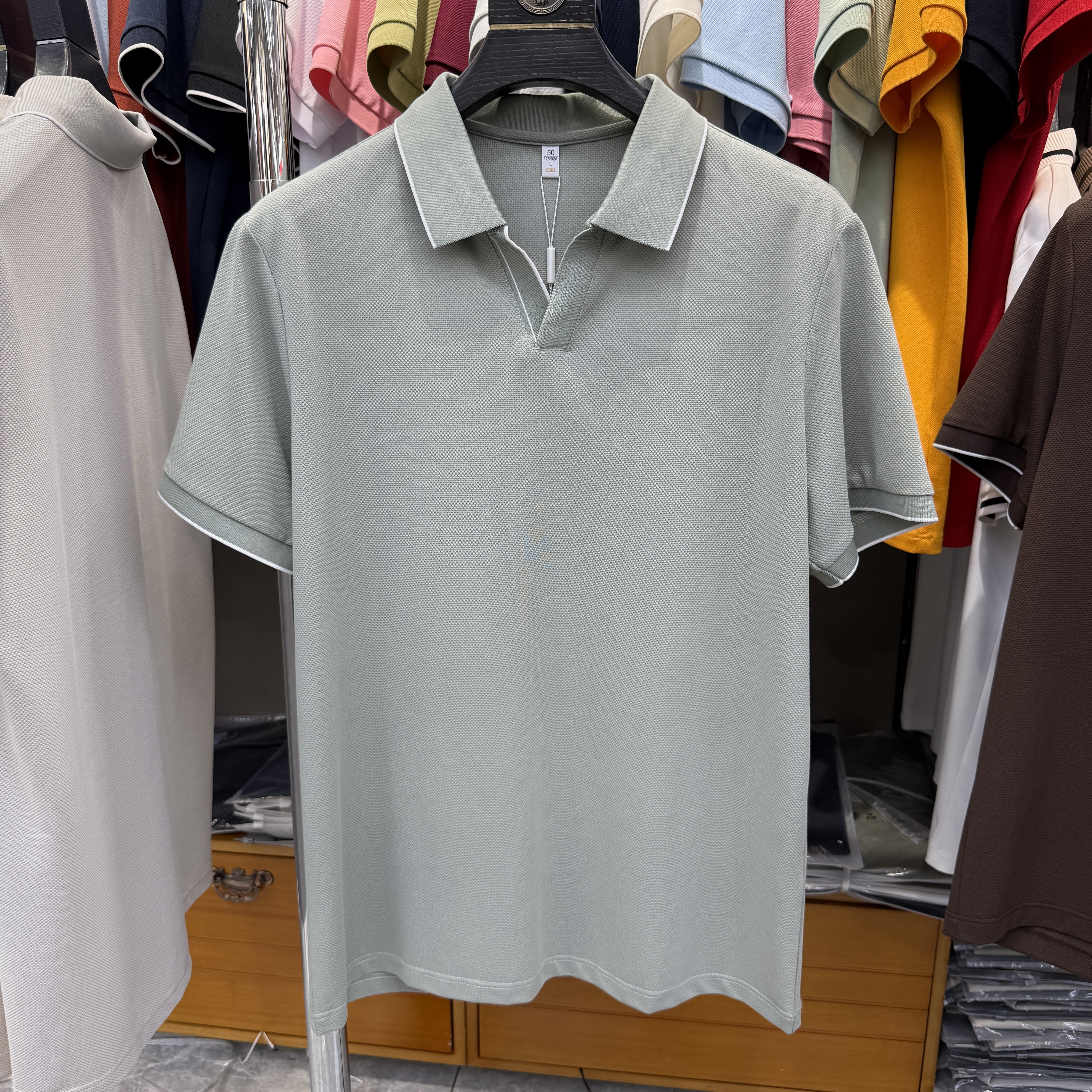 JM7305 54.4% Polyester 39.4% Cotton 6.2% Spandex Short-sleeve polo shirt