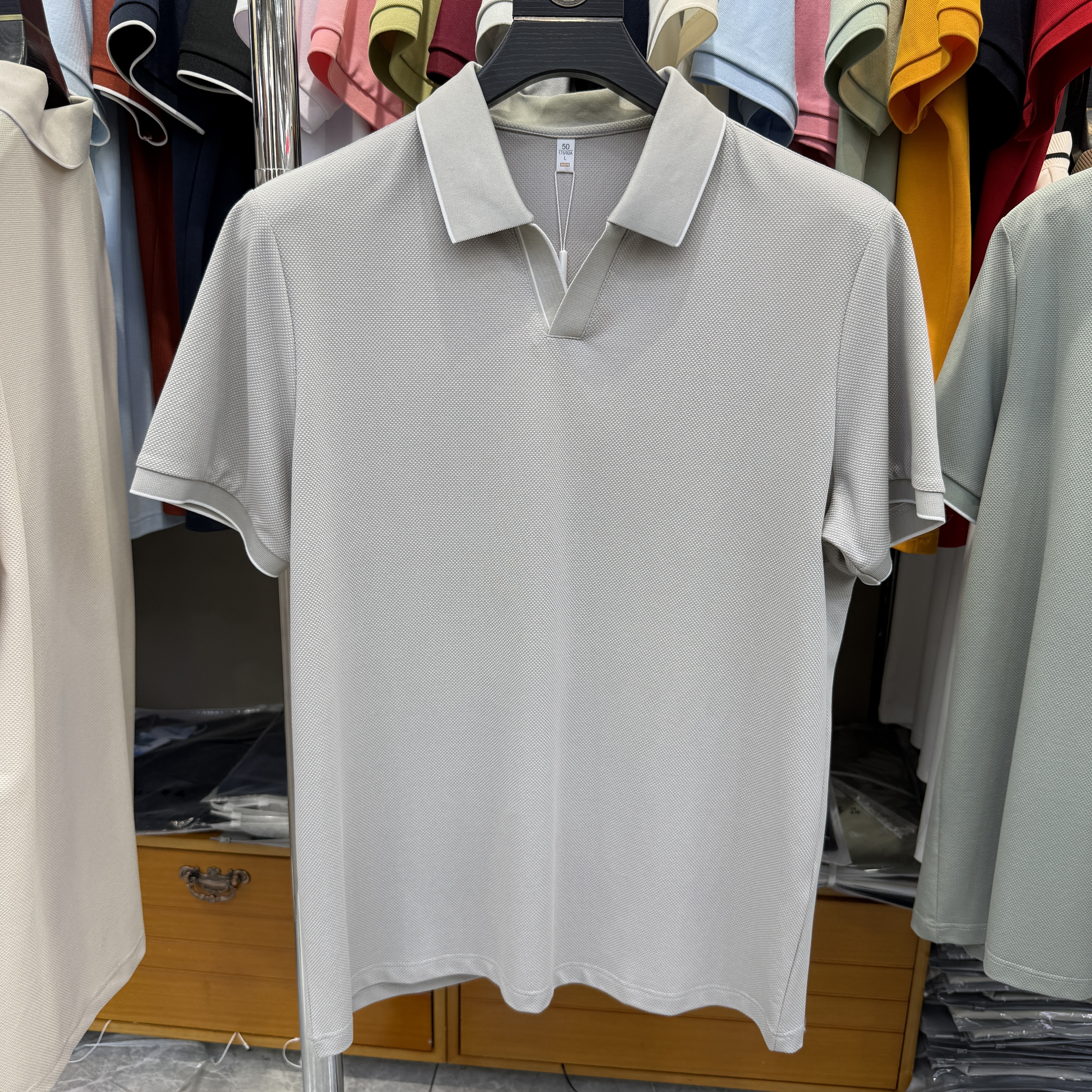 JM7305 54.4% Polyester 39.4% Cotton 6.2% Spandex Short-sleeve polo shirt