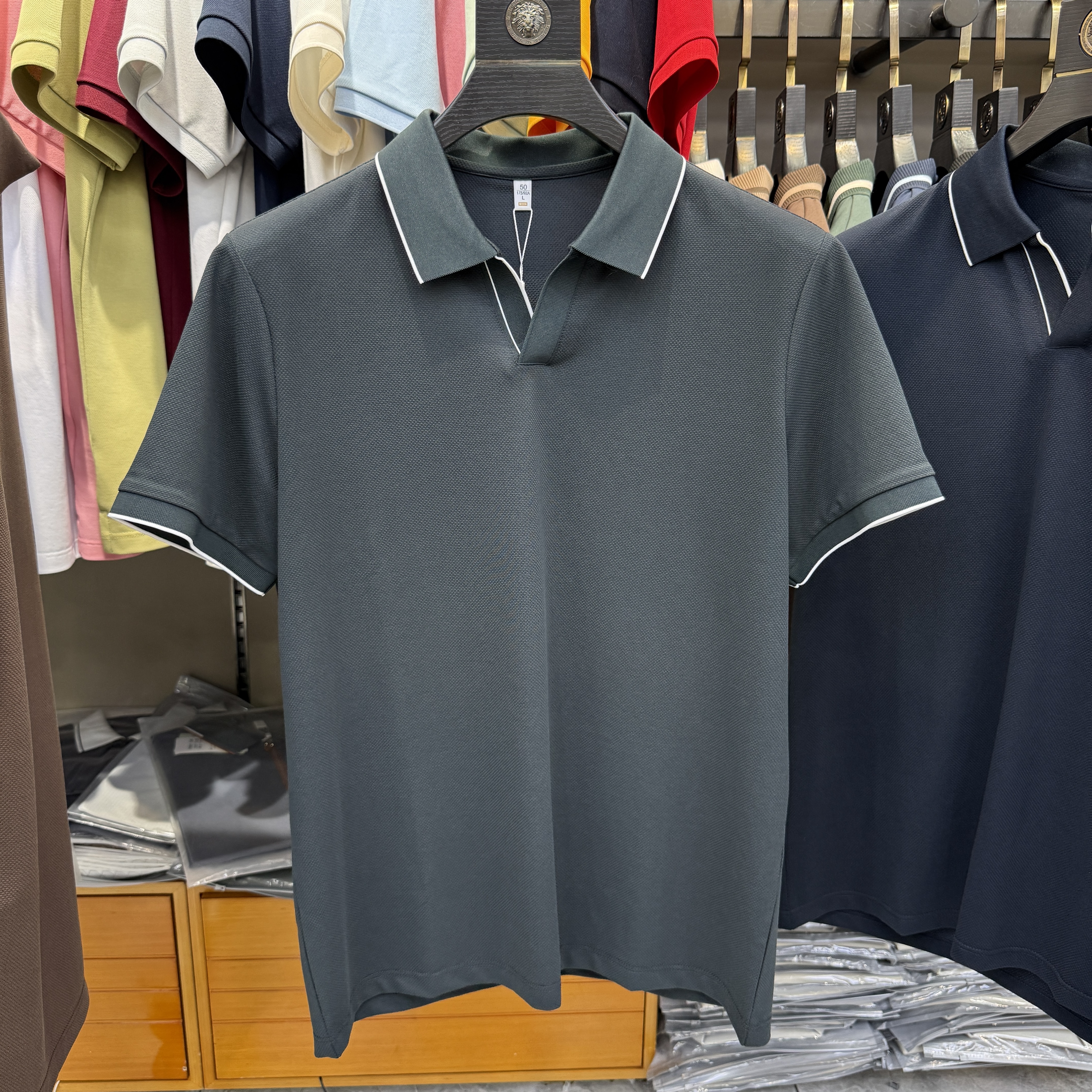 JM7305 54.4% Polyester 39.4% Cotton 6.2% Spandex Short-sleeve polo shirt
