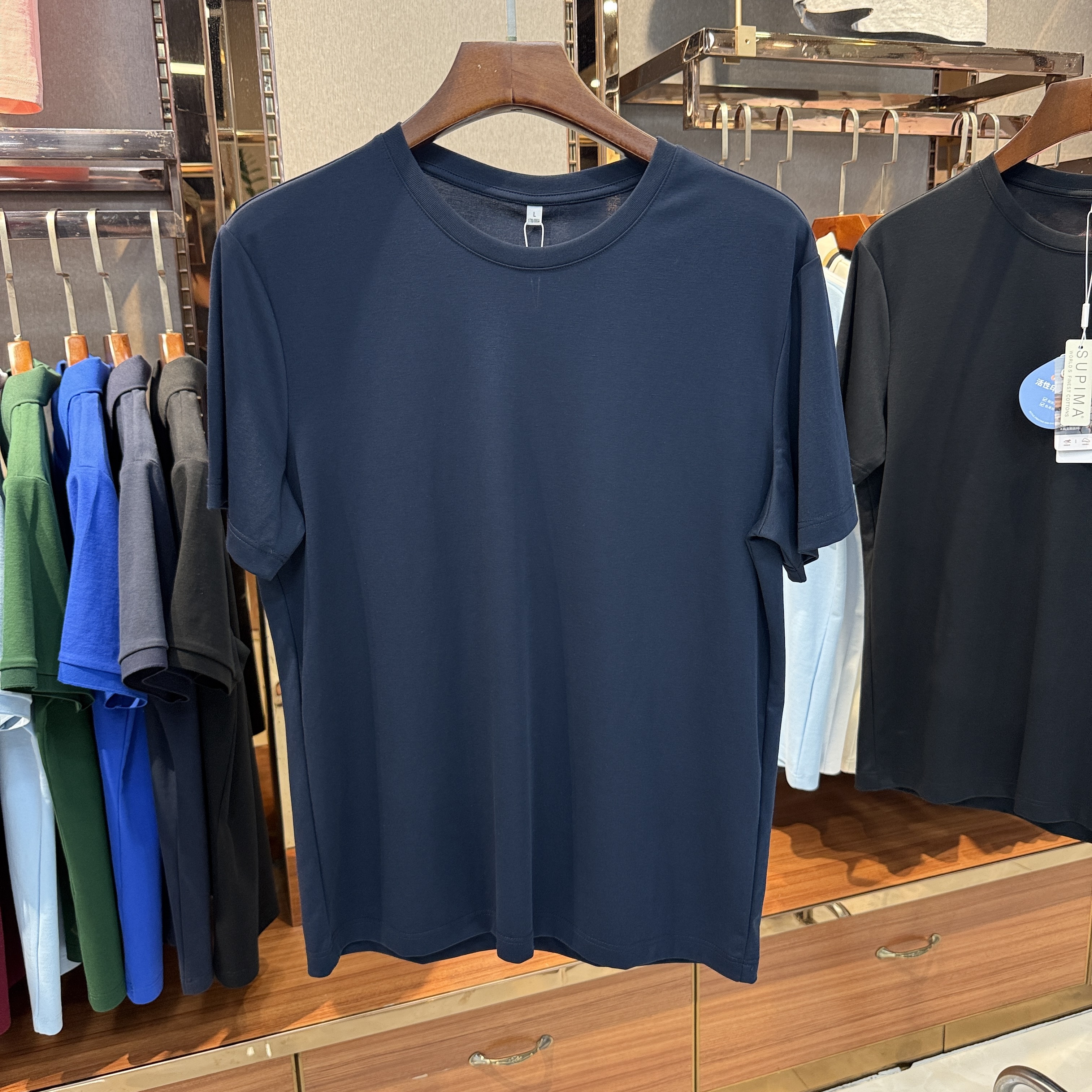 SKS770 61% Pima Cotton  31.1% Polyester 7.9% Spandex T-shirt