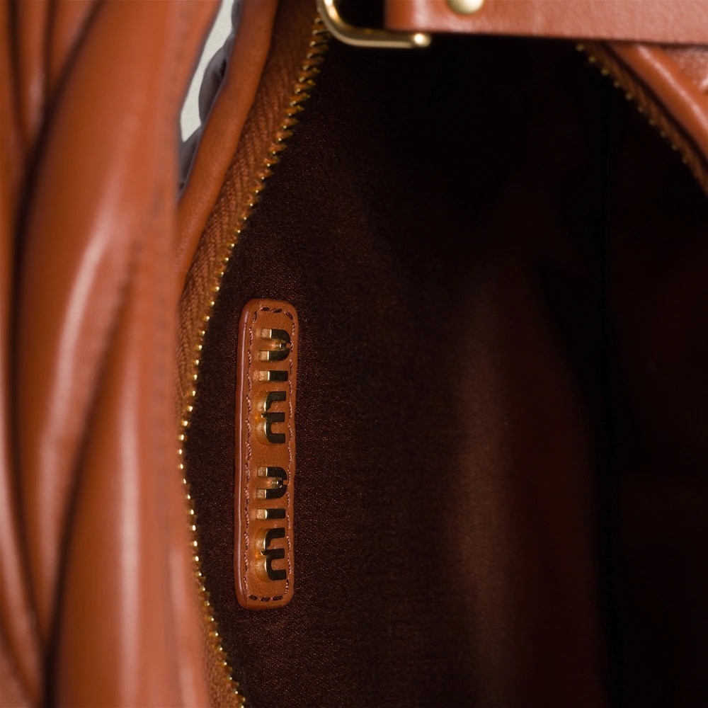 Wander matelassé nappa leather hobo bag