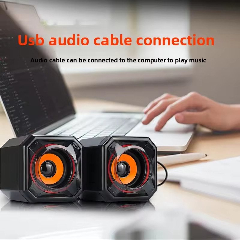 Green & Orange Eye RGB Gaming Speakers
