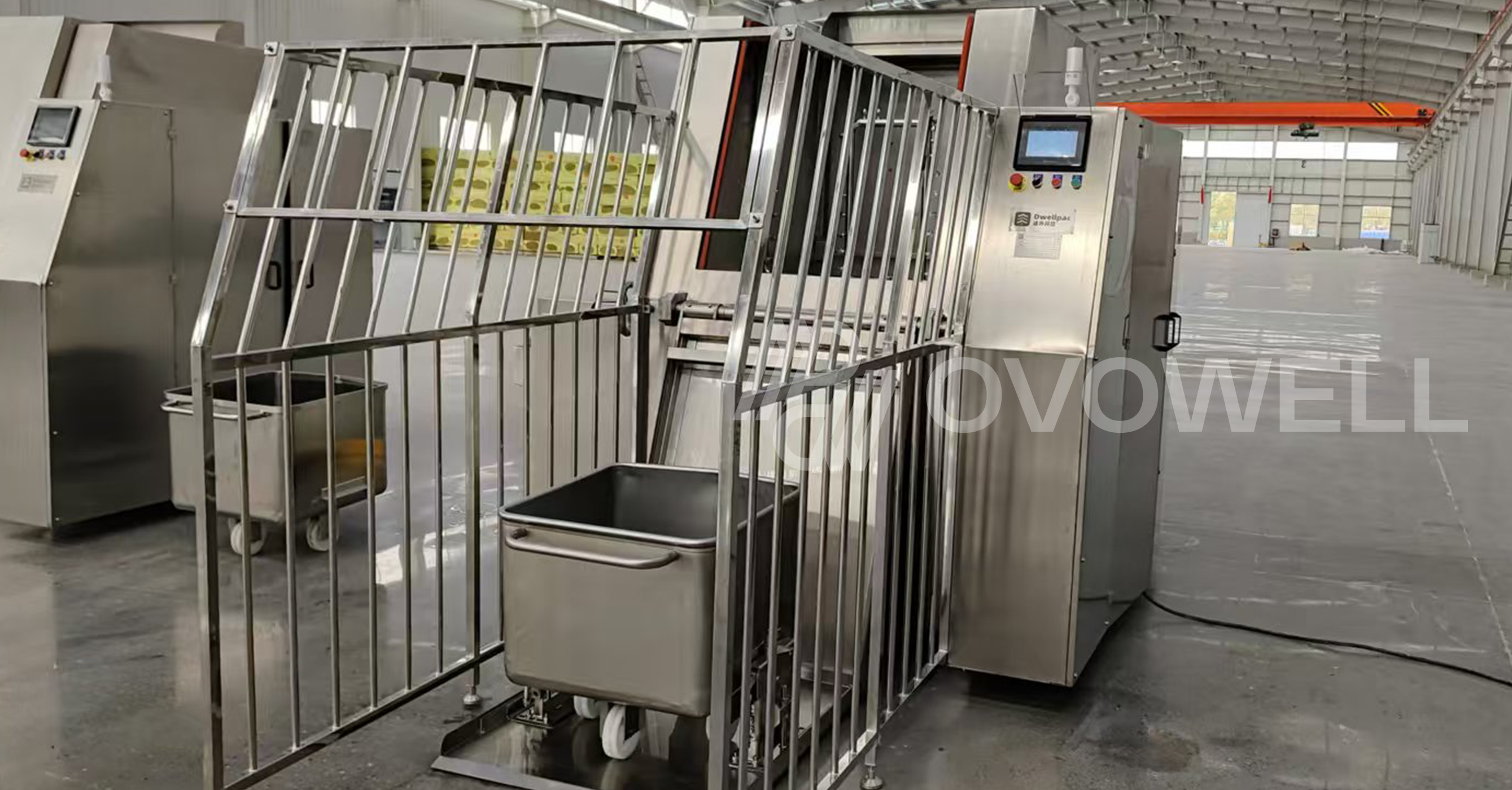 Automatic meat trolley washing machine in a processing facility