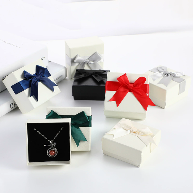 Moyi Packaging Classic White Jewelry Box With Colorful Bows Custom Ribbon Options