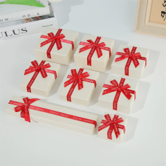 Premium White Gift Box With Bold Red Ribbon Bows Fine Jewelry Packaging By Moyi