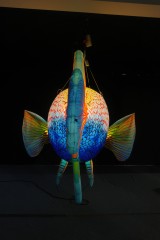 Activity Promotion Advertisement: Tropical Fish Inflatable Models, with an Ocean Atmosphere and Scene-specific Decorative Props.