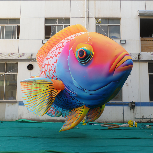 Activity Promotion Advertisement: Tropical Fish Inflatable Models, with an Ocean Atmosphere and Scene-specific Decorative Props.