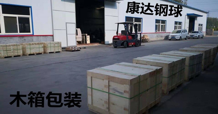 Stacked wooden crates outside factory for steel ball packaging