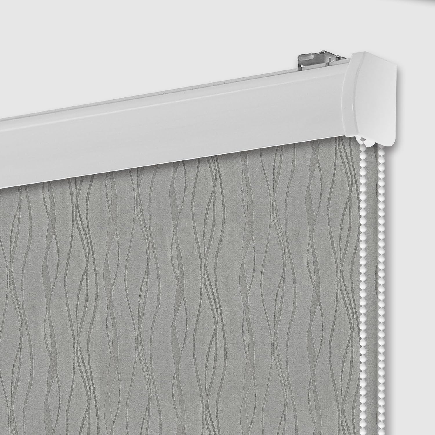 Grey blackout roller blind with cord control and top cassette