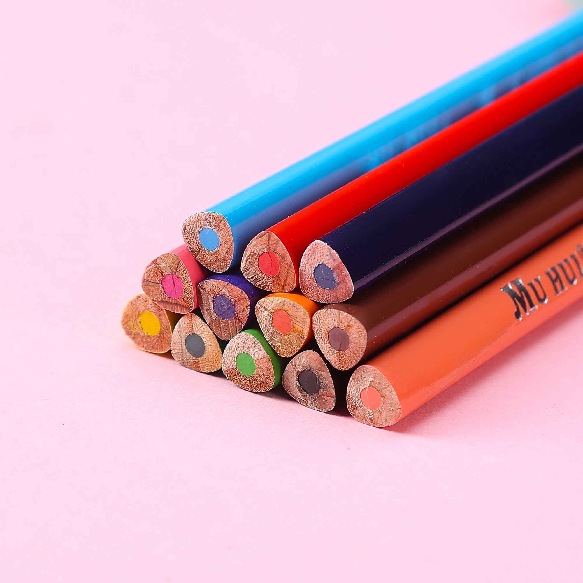 Muhui 12 color triangular pole softened wood advanced core children's writing and painting color lead cartoon fruit color box packaging