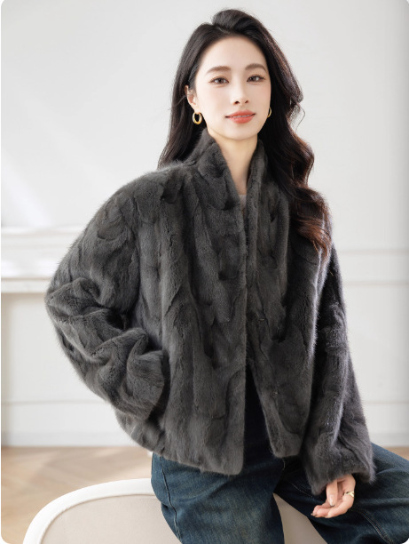 New short-style waterfowl fur coat with a casual small collar and a faux waterfowl fur patch. Women's waterfowl fur coat.