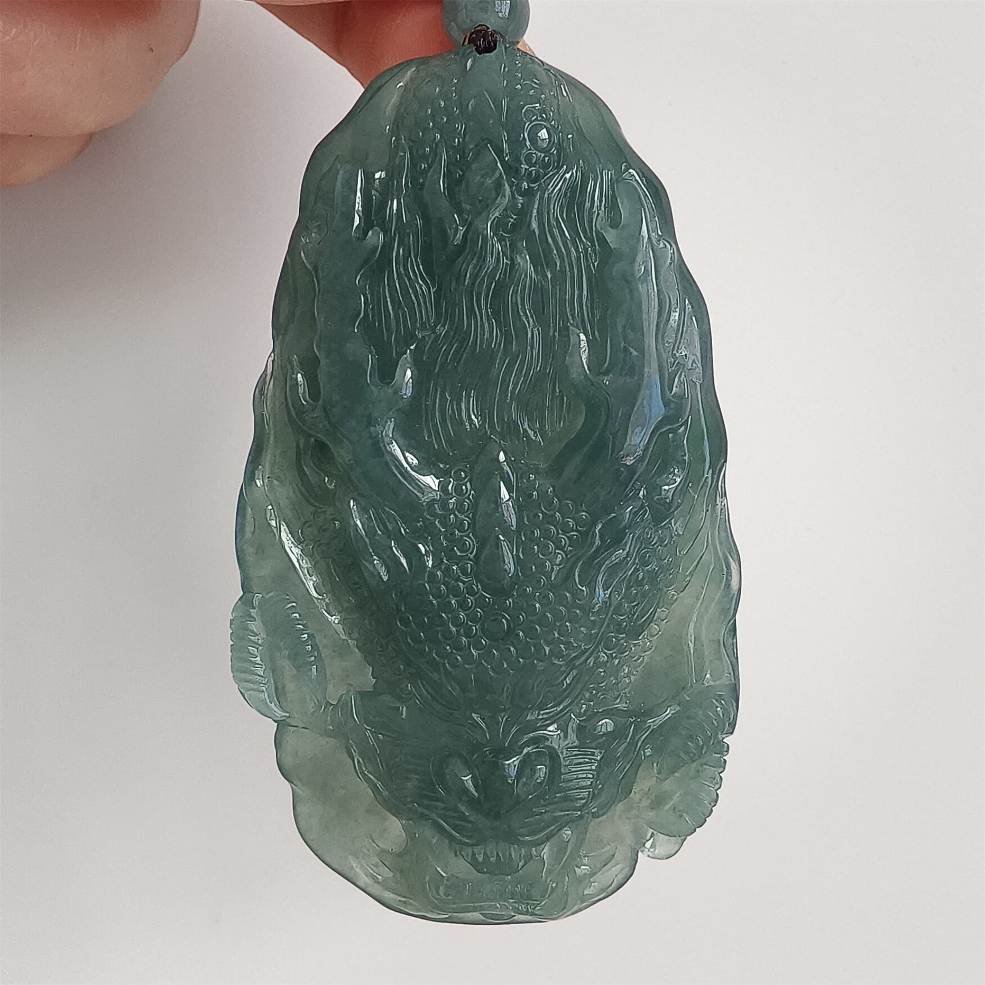 DDP 66mm Natural Type A Untreated Icy Waxy Blue Watery Guatemalan Jadeite Dragon Pendant