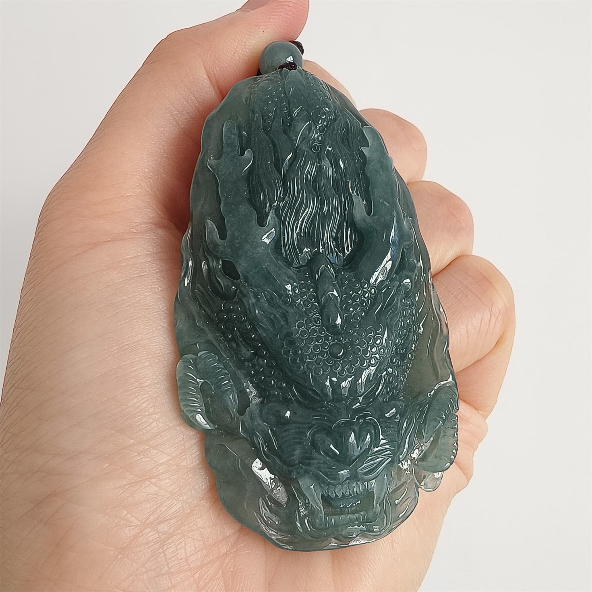 DDP 66mm Natural Type A Untreated Icy Waxy Blue Watery Guatemalan Jadeite Dragon Pendant