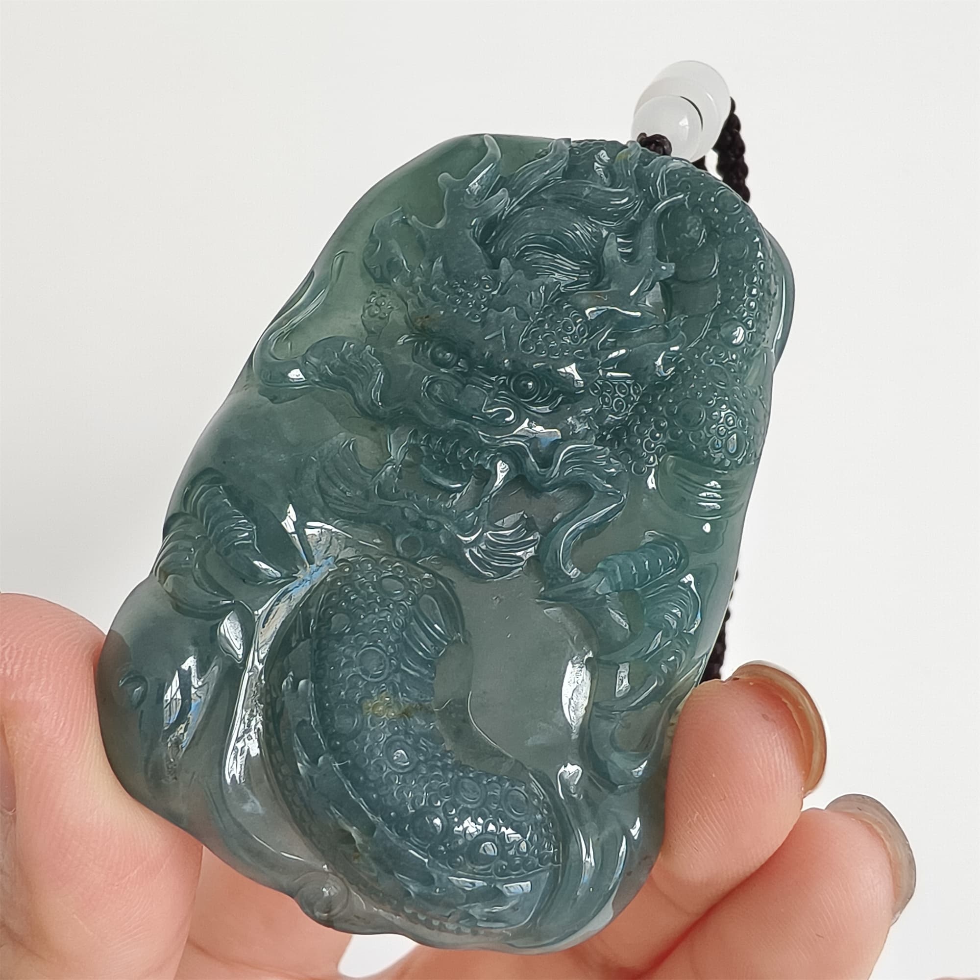 DDP 66mm Natural Type A Untreated Icy Waxy Blue Watery Guatemalan Jadeite Dragon Pendant