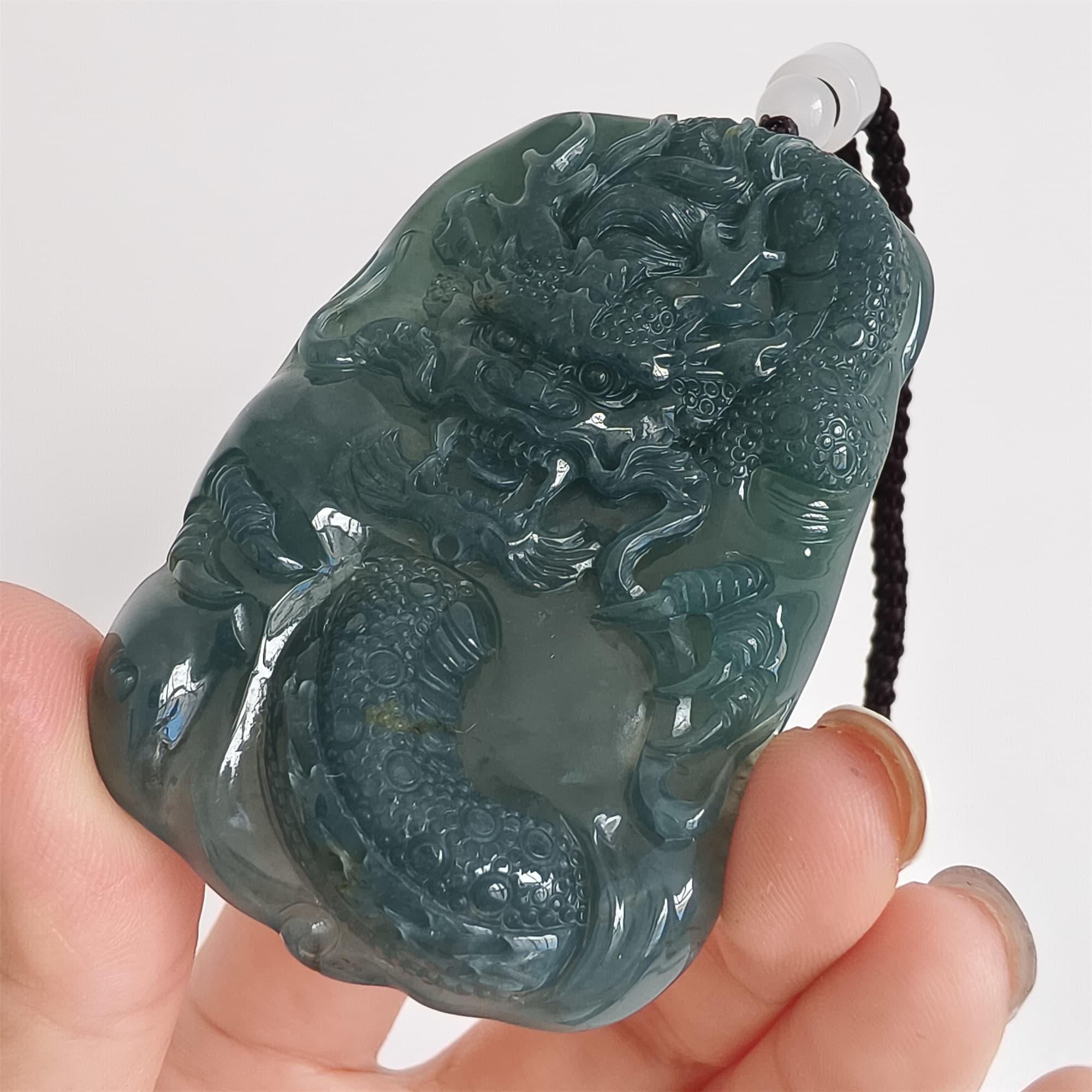 DDP 66mm Natural Type A Untreated Icy Waxy Blue Watery Guatemalan Jadeite Dragon Pendant