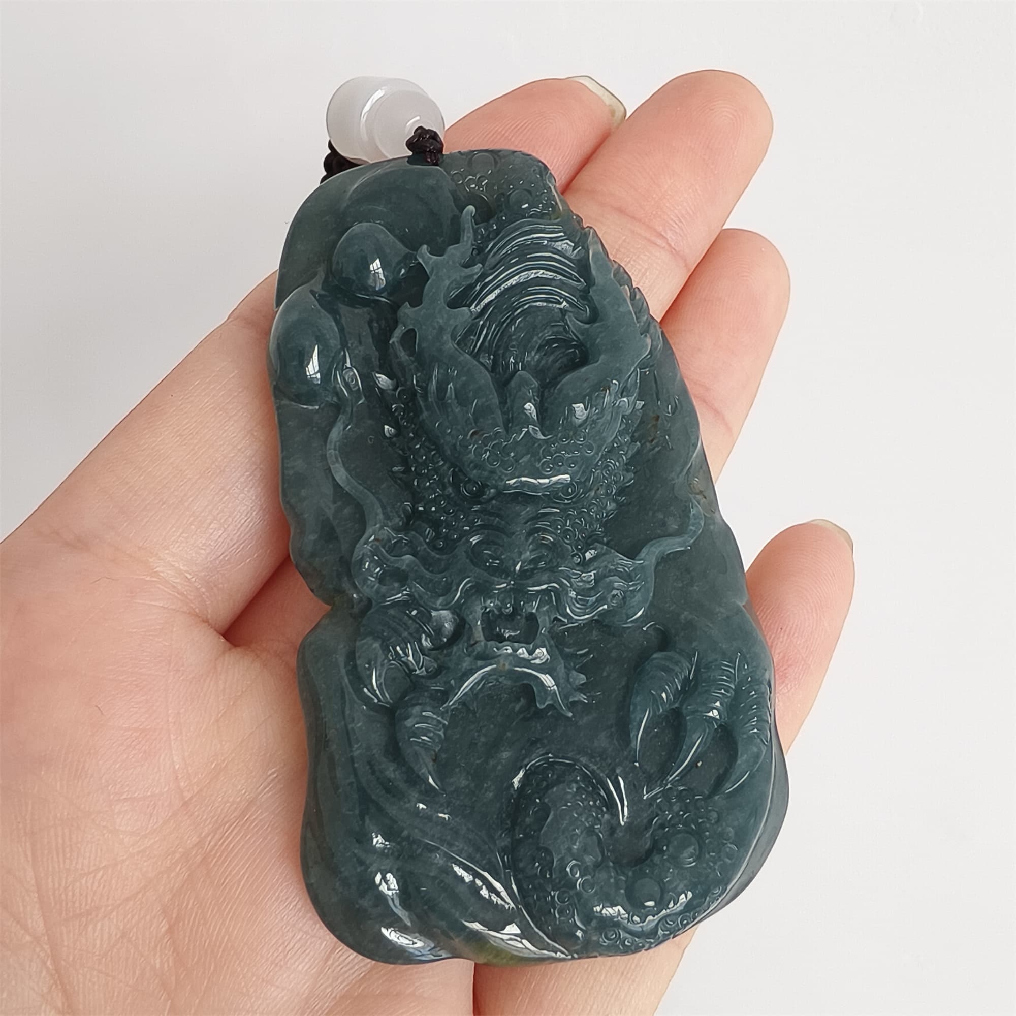 DDP 66mm Natural Type A Untreated Icy Waxy Blue Watery Guatemalan Jadeite Dragon Pendant