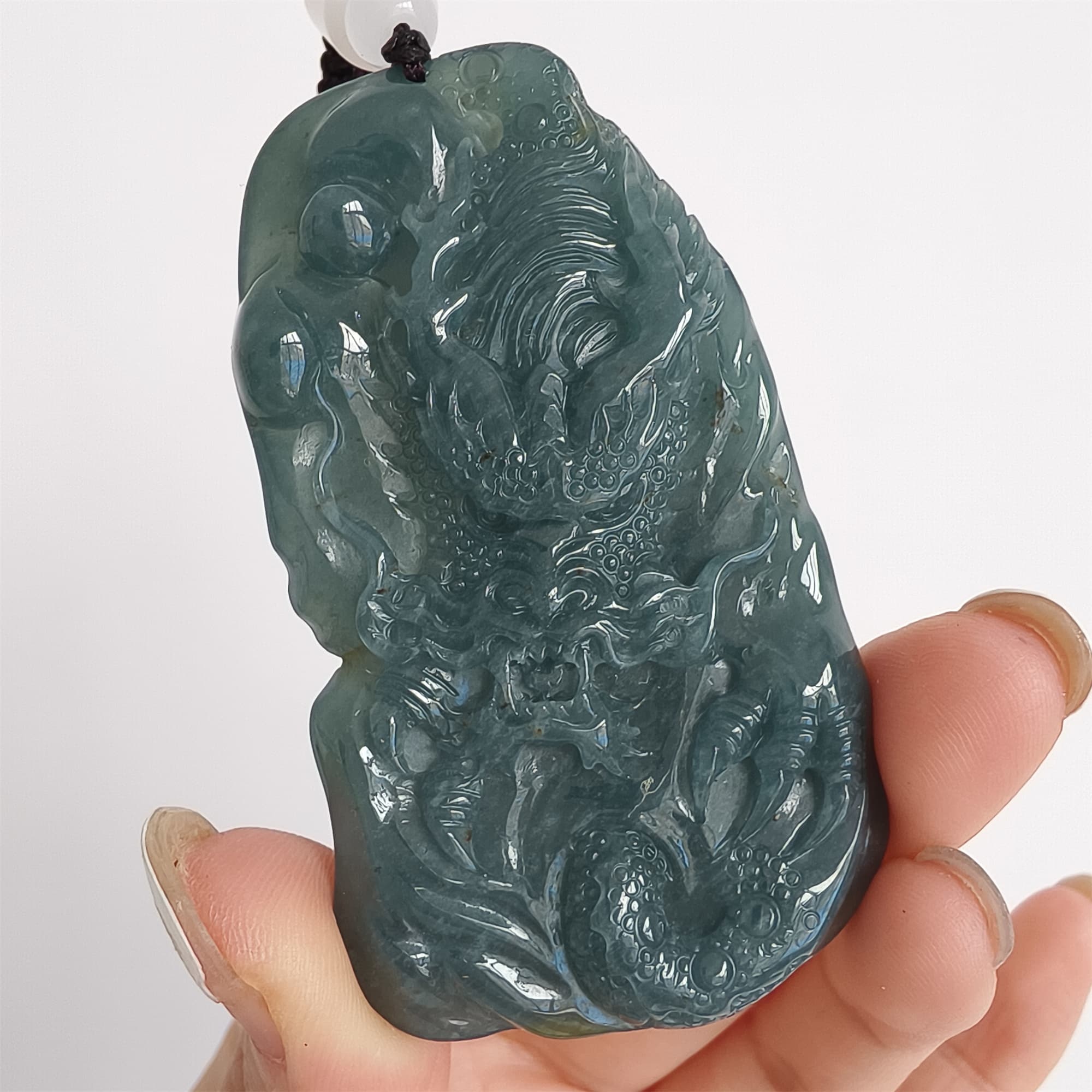 DDP 66mm Natural Type A Untreated Icy Waxy Blue Watery Guatemalan Jadeite Dragon Pendant