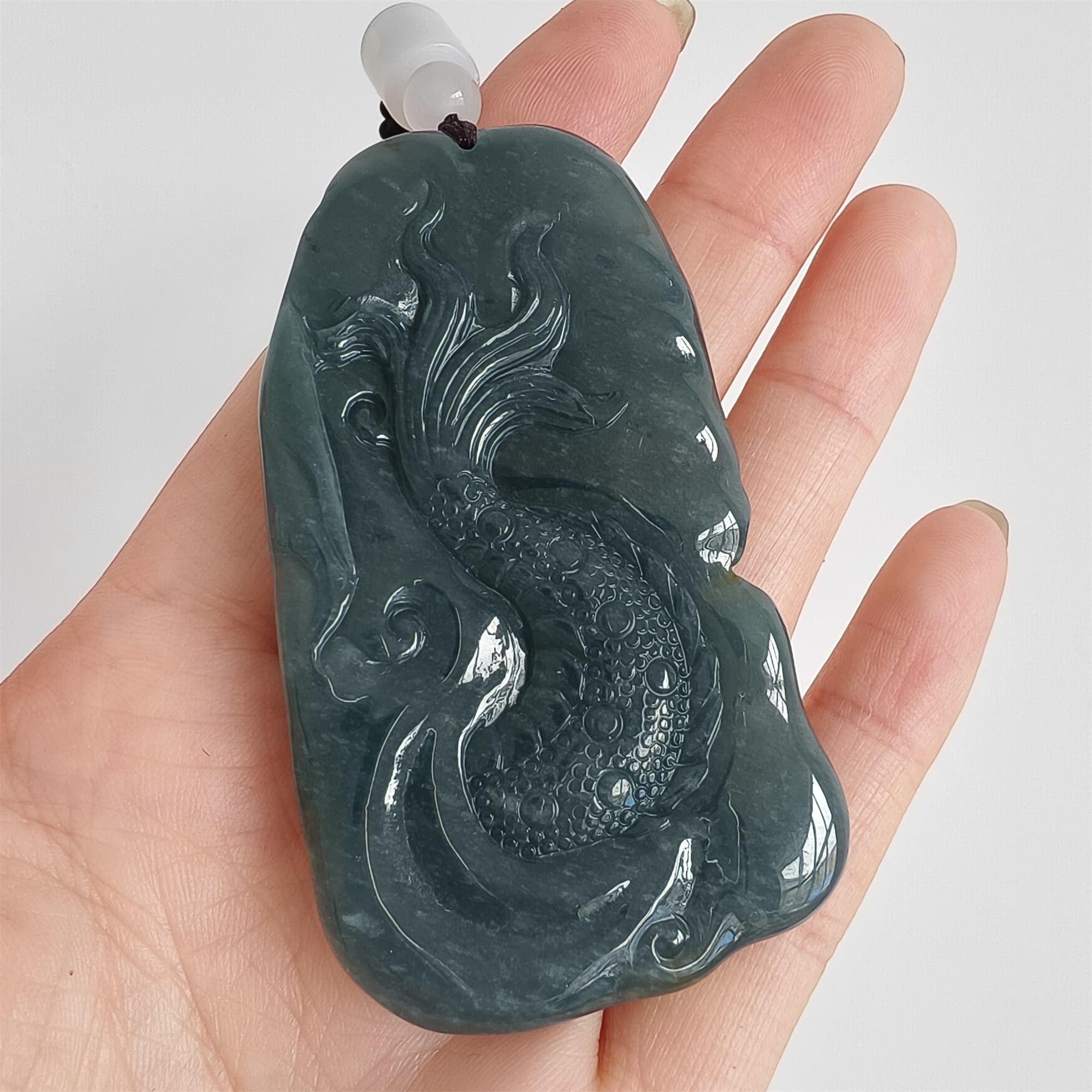 DDP 66mm Natural Type A Untreated Icy Waxy Blue Watery Guatemalan Jadeite Dragon Pendant