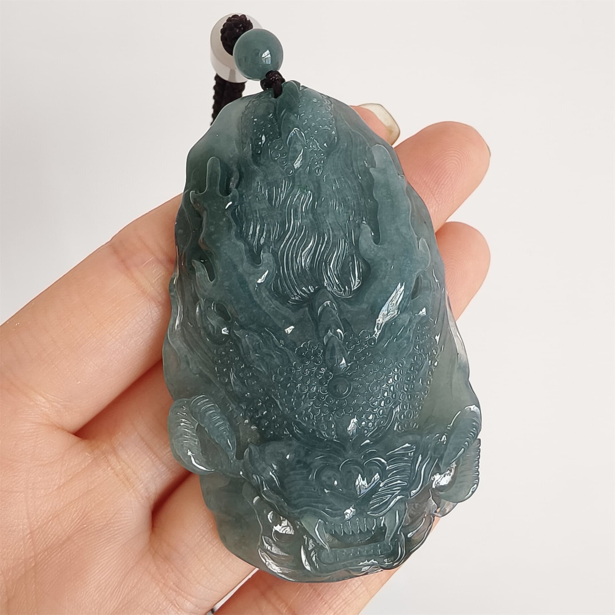 DDP 66.5mm Natural Type A Untreated Icy Waxy Blue Watery Guatemalan Jadeite Dragon Pendant