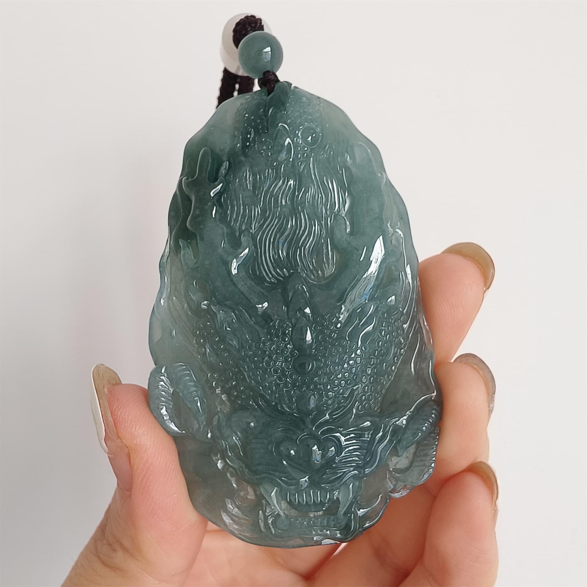 DDP 66.5mm Natural Type A Untreated Icy Waxy Blue Watery Guatemalan Jadeite Dragon Pendant