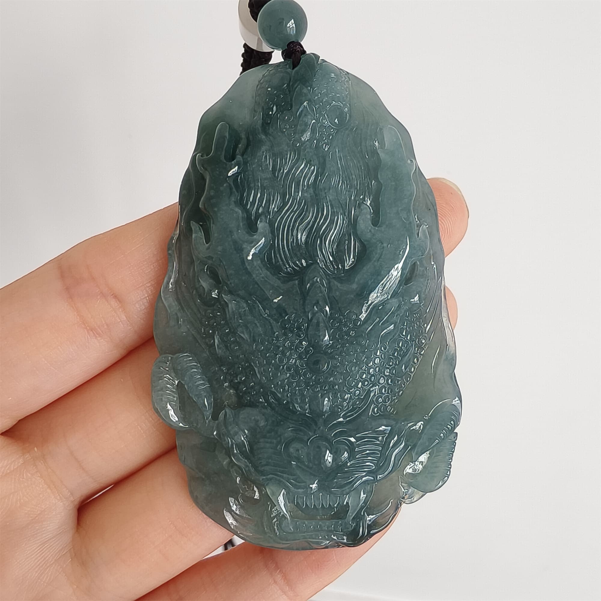 DDP 66.5mm Natural Type A Untreated Icy Waxy Blue Watery Guatemalan Jadeite Dragon Pendant