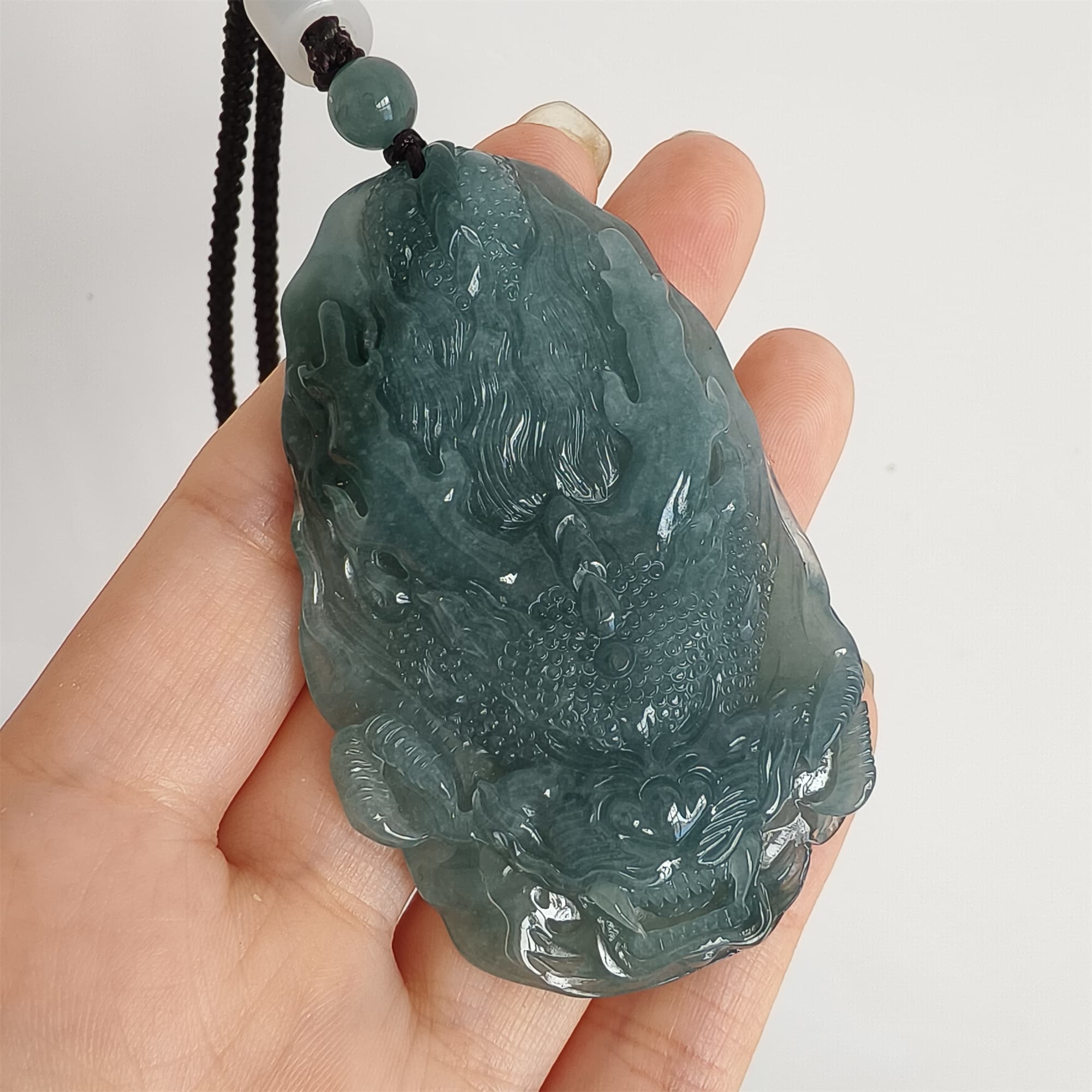DDP 66.5mm Natural Type A Untreated Icy Waxy Blue Watery Guatemalan Jadeite Dragon Pendant
