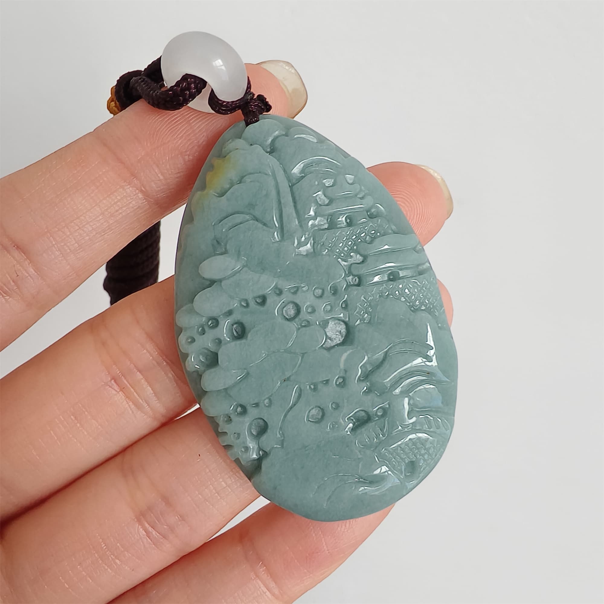 DDP 47.5mm Natural Certificated Type A Blue Guatemalan Jadeite Oval Pendant With Landscape Carved