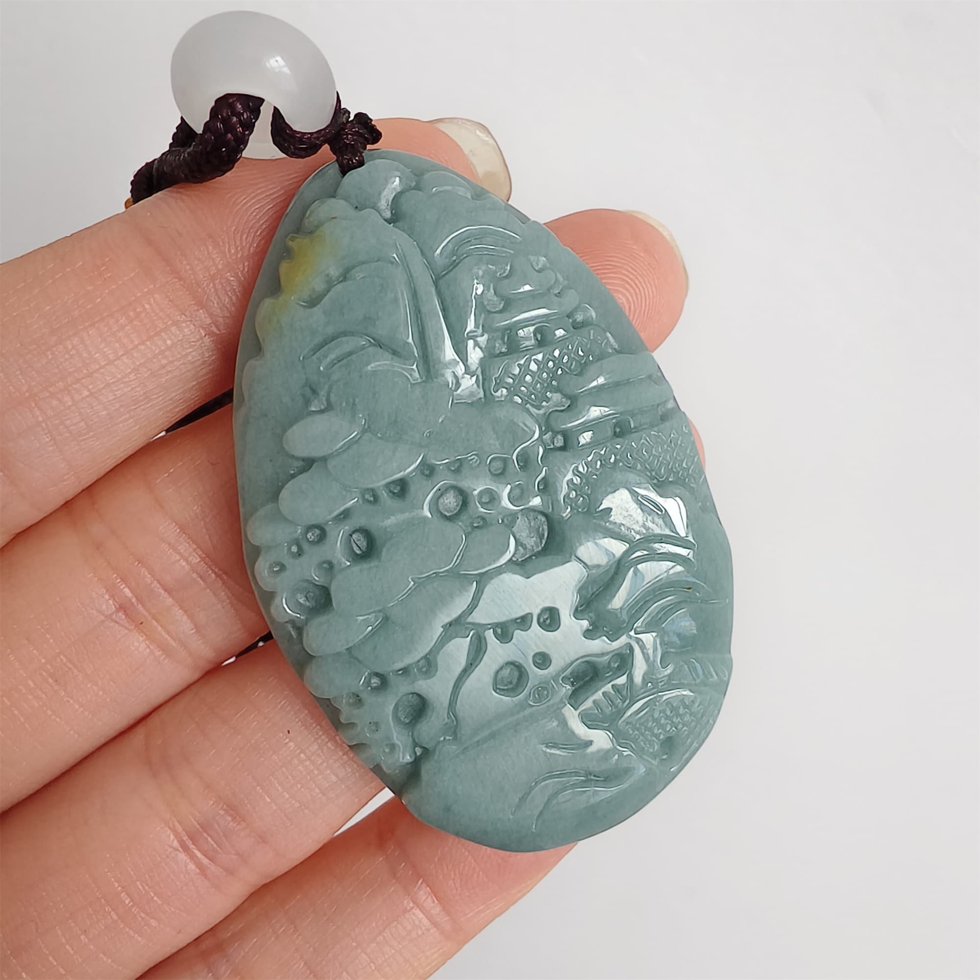 DDP 47.5mm Natural Certificated Type A Blue Guatemalan Jadeite Oval Pendant With Landscape Carved