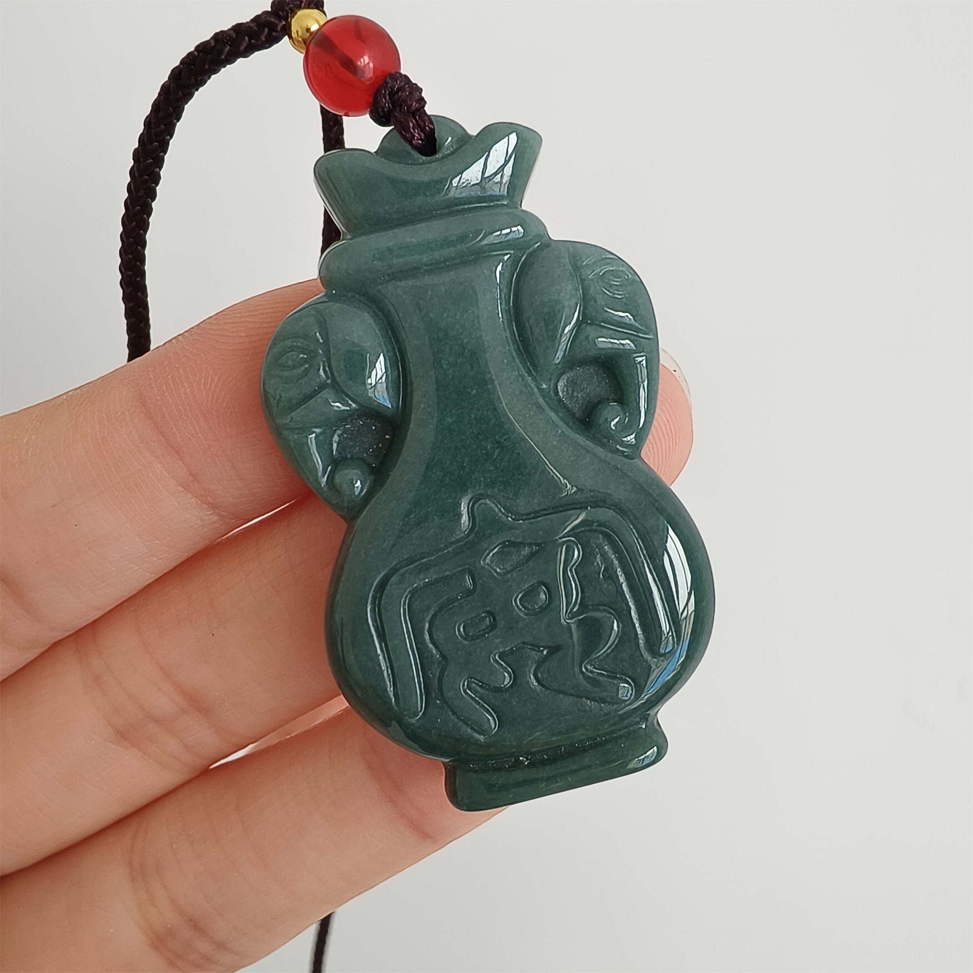 DDP 43mm Natural Certificated Type A Icy Blue Guatemalan Jadeite Elephant Ear Vase Pendant