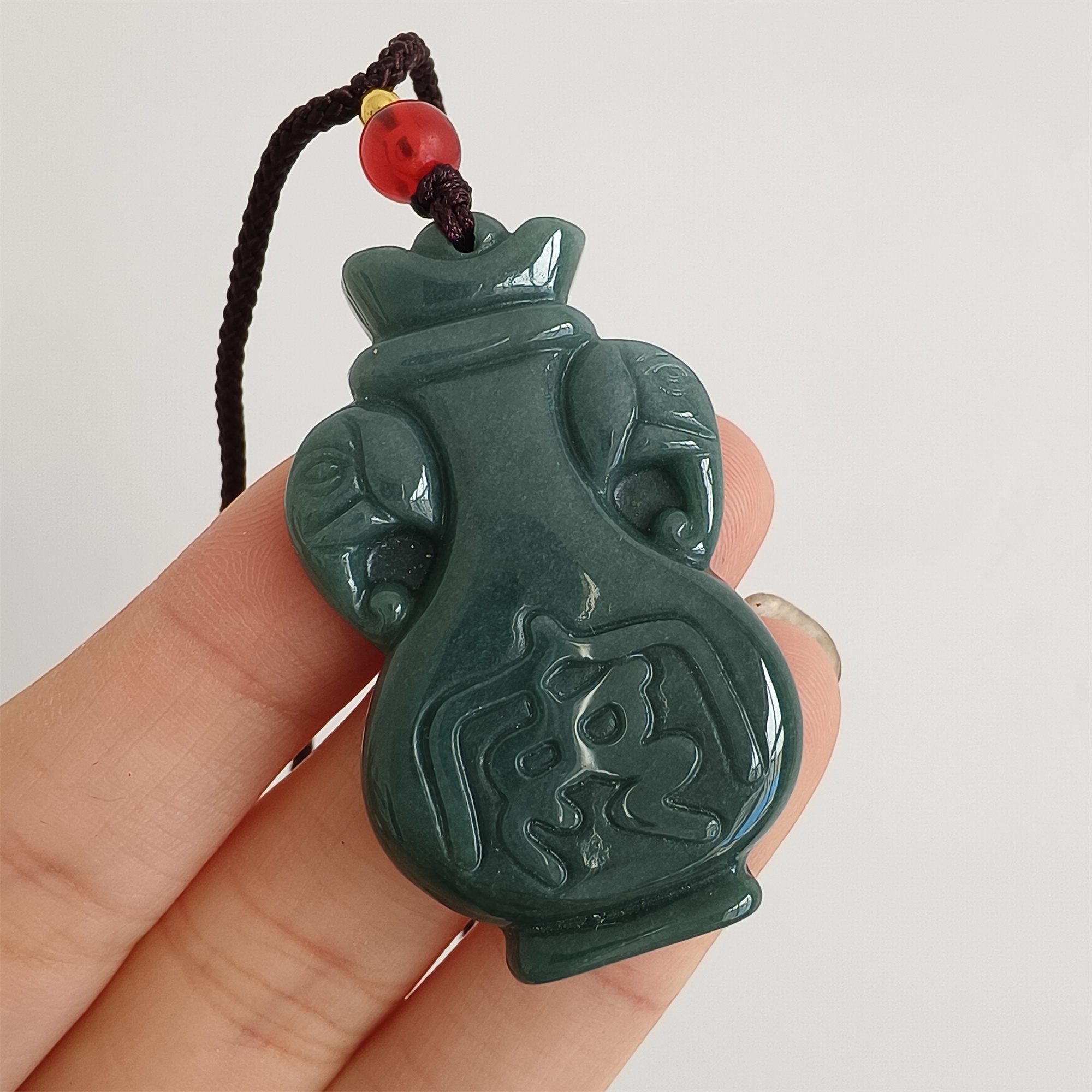 DDP 43mm Natural Certificated Type A Icy Blue Guatemalan Jadeite Elephant Ear Vase Pendant