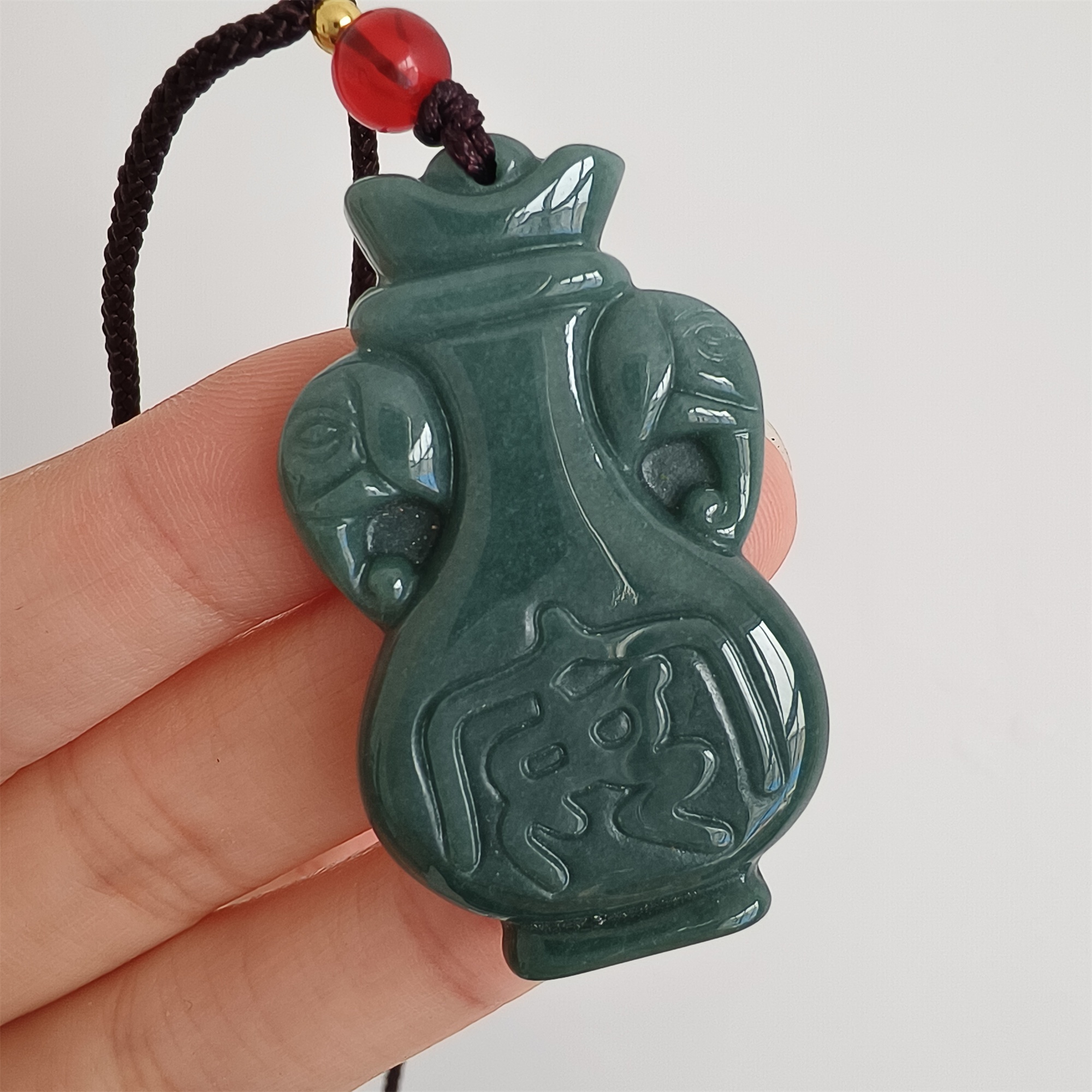 DDP 43mm Natural Certificated Type A Icy Blue Guatemalan Jadeite Elephant Ear Vase Pendant