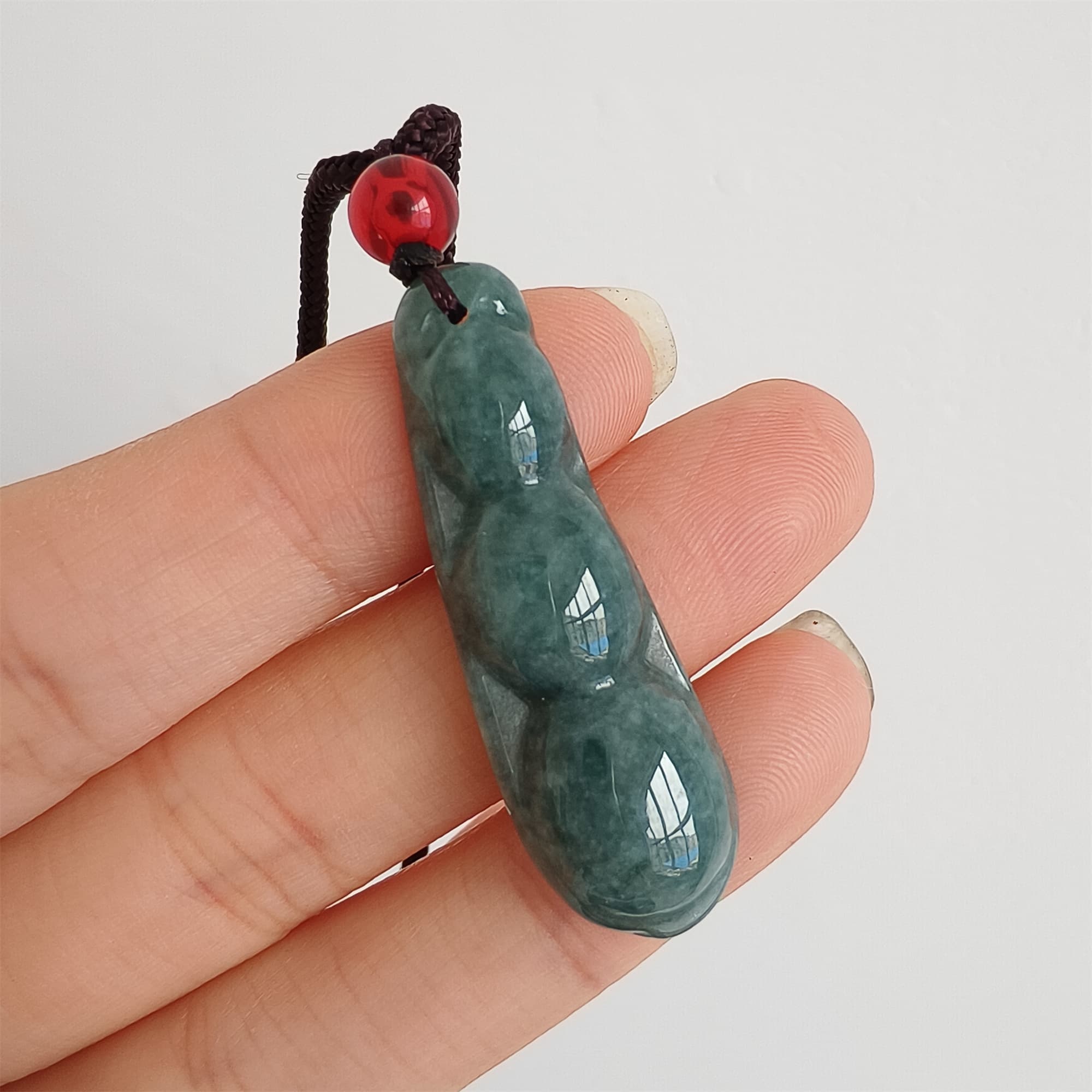 DDP 37.5mm Natural Type A Icy Blue Guatemalan Jadeite Green Bean Pendant