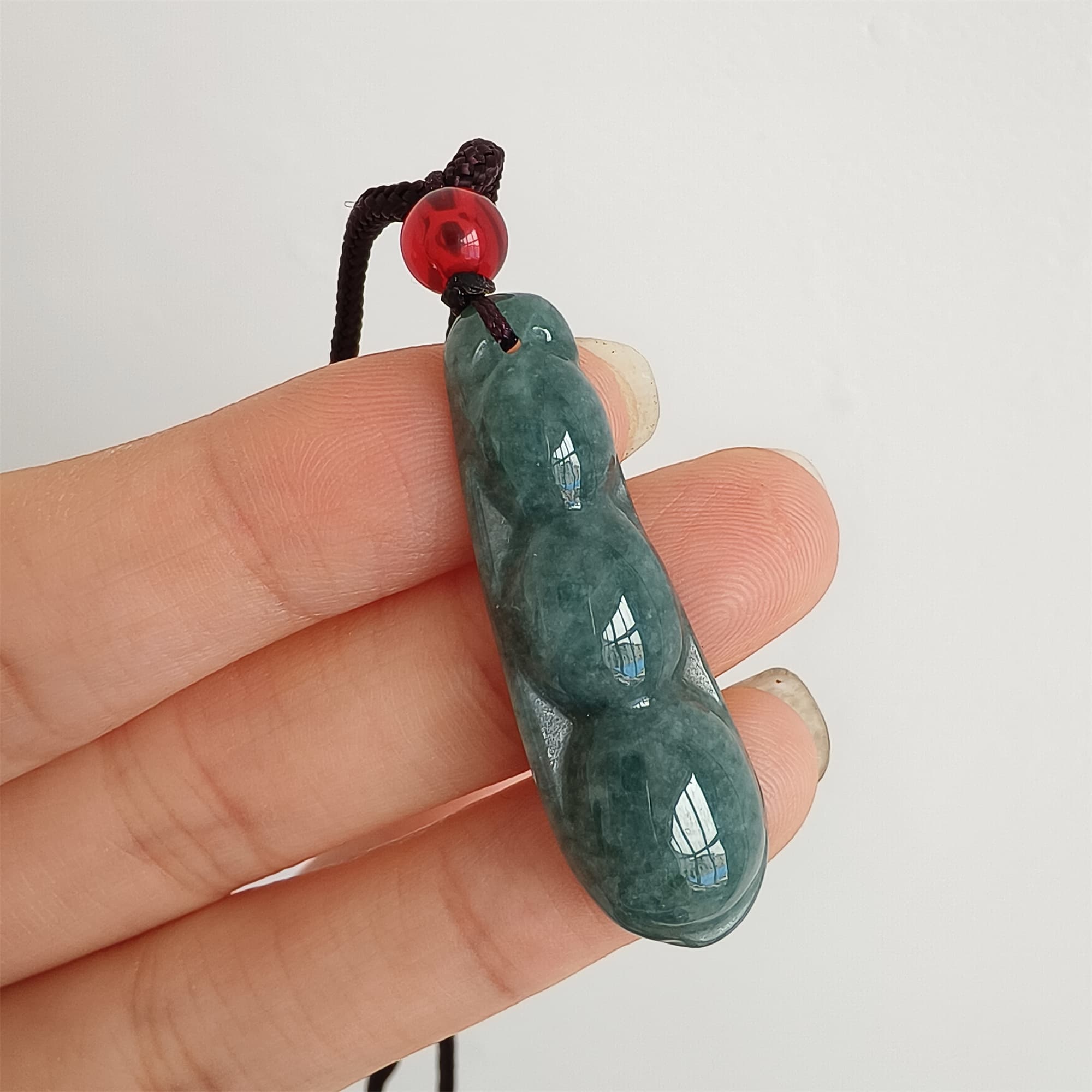 DDP 37.5mm Natural Type A Icy Blue Guatemalan Jadeite Green Bean Pendant