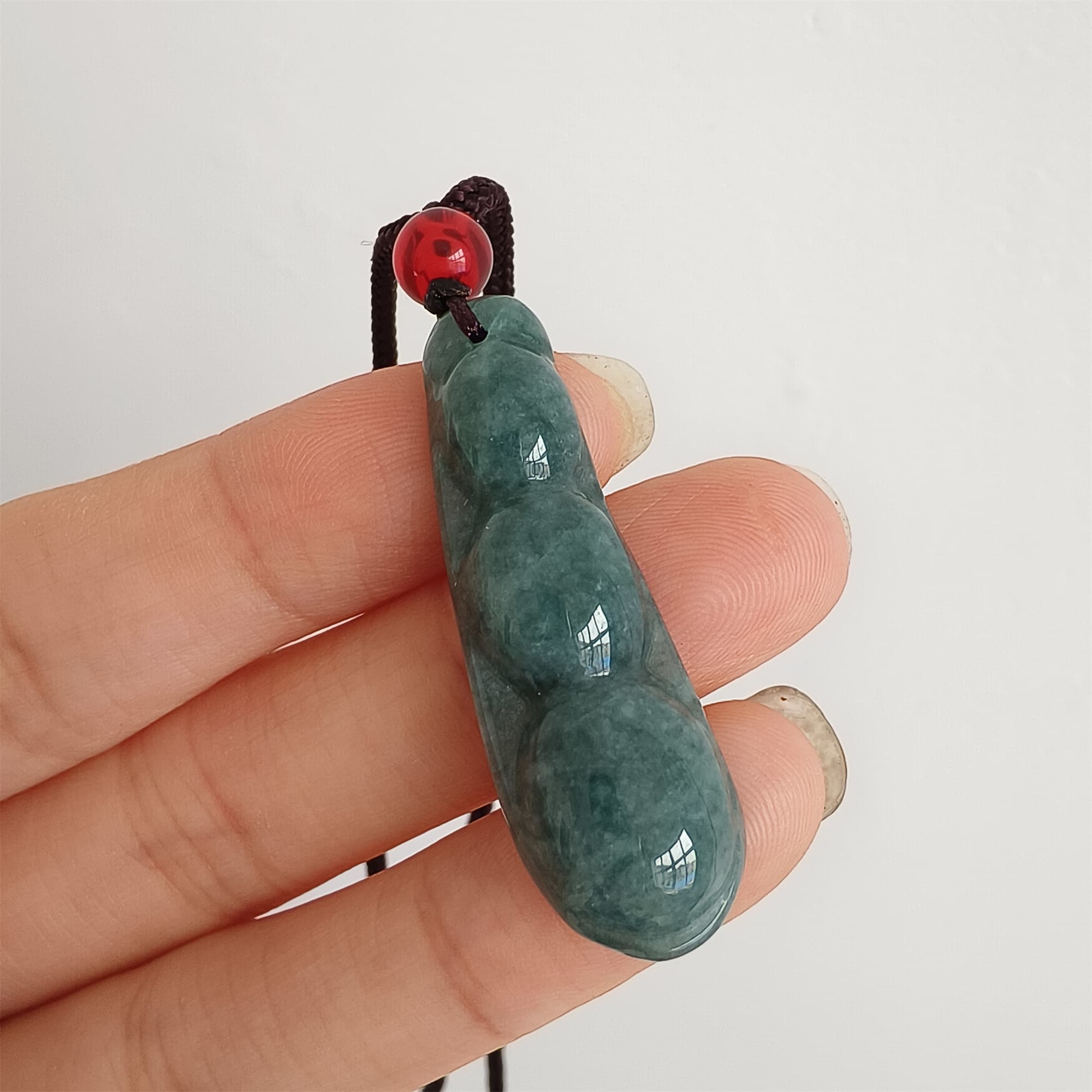 DDP 37.5mm Natural Type A Icy Blue Guatemalan Jadeite Green Bean Pendant