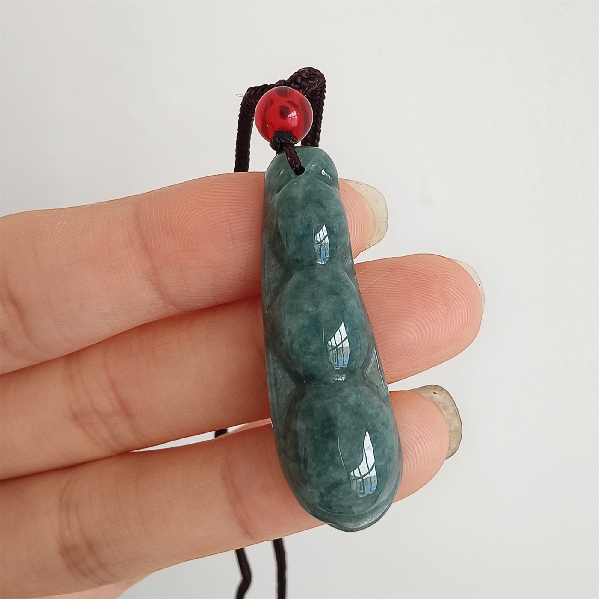 DDP 37.5mm Natural Type A Icy Blue Guatemalan Jadeite Green Bean Pendant