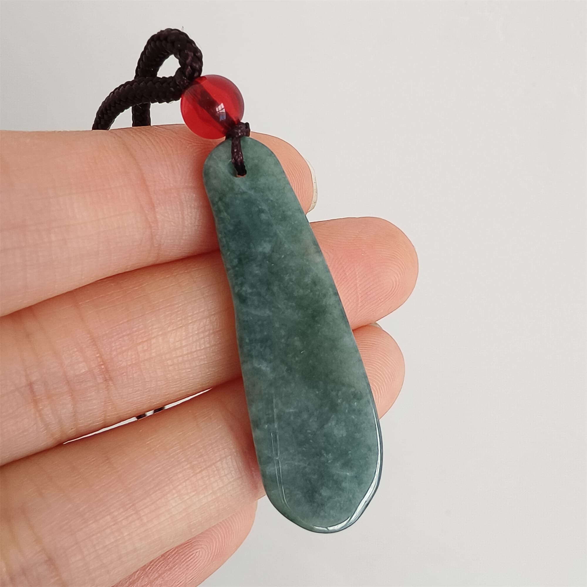 DDP 37.5mm Natural Type A Icy Blue Guatemalan Jadeite Green Bean Pendant