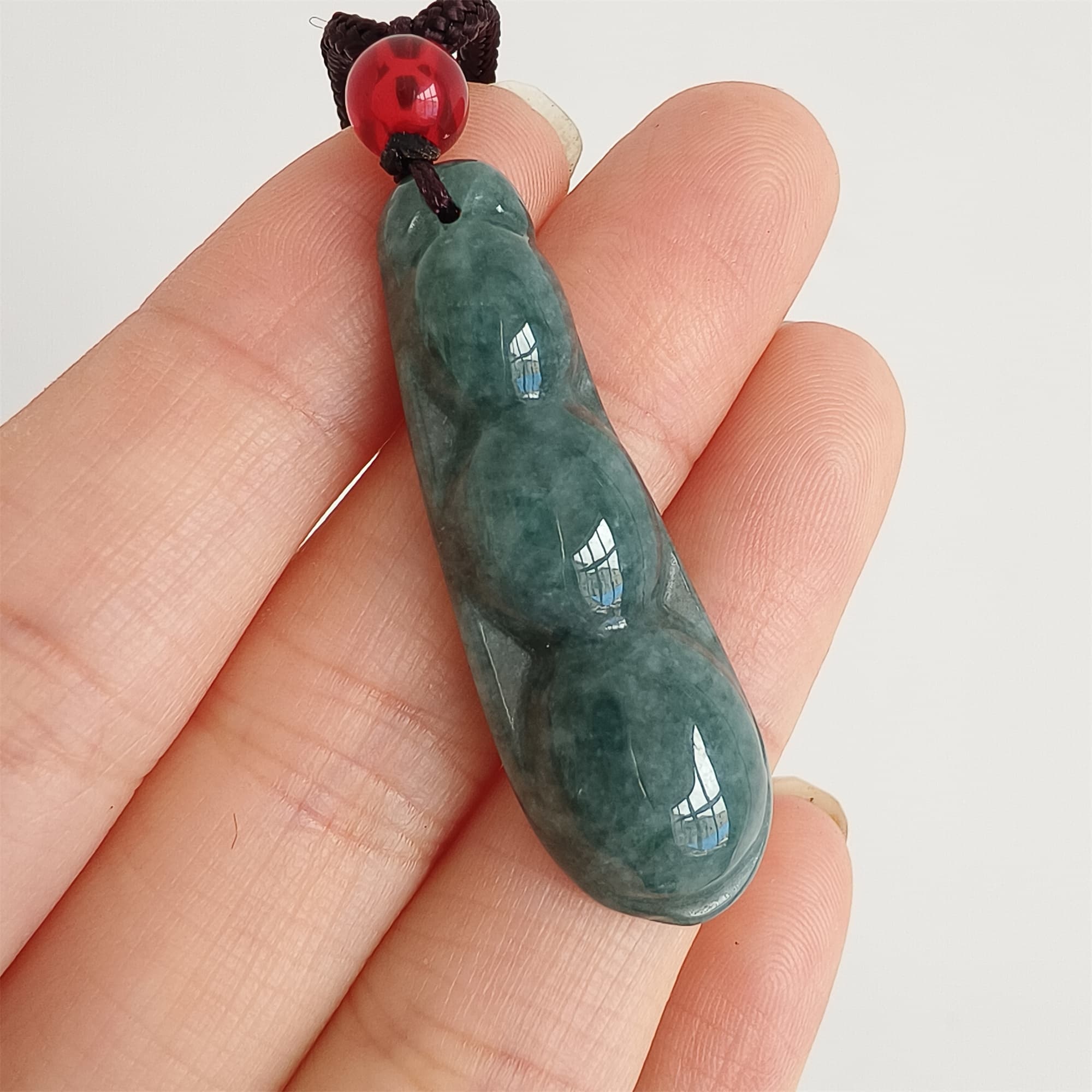 DDP 37.5mm Natural Type A Icy Blue Guatemalan Jadeite Green Bean Pendant